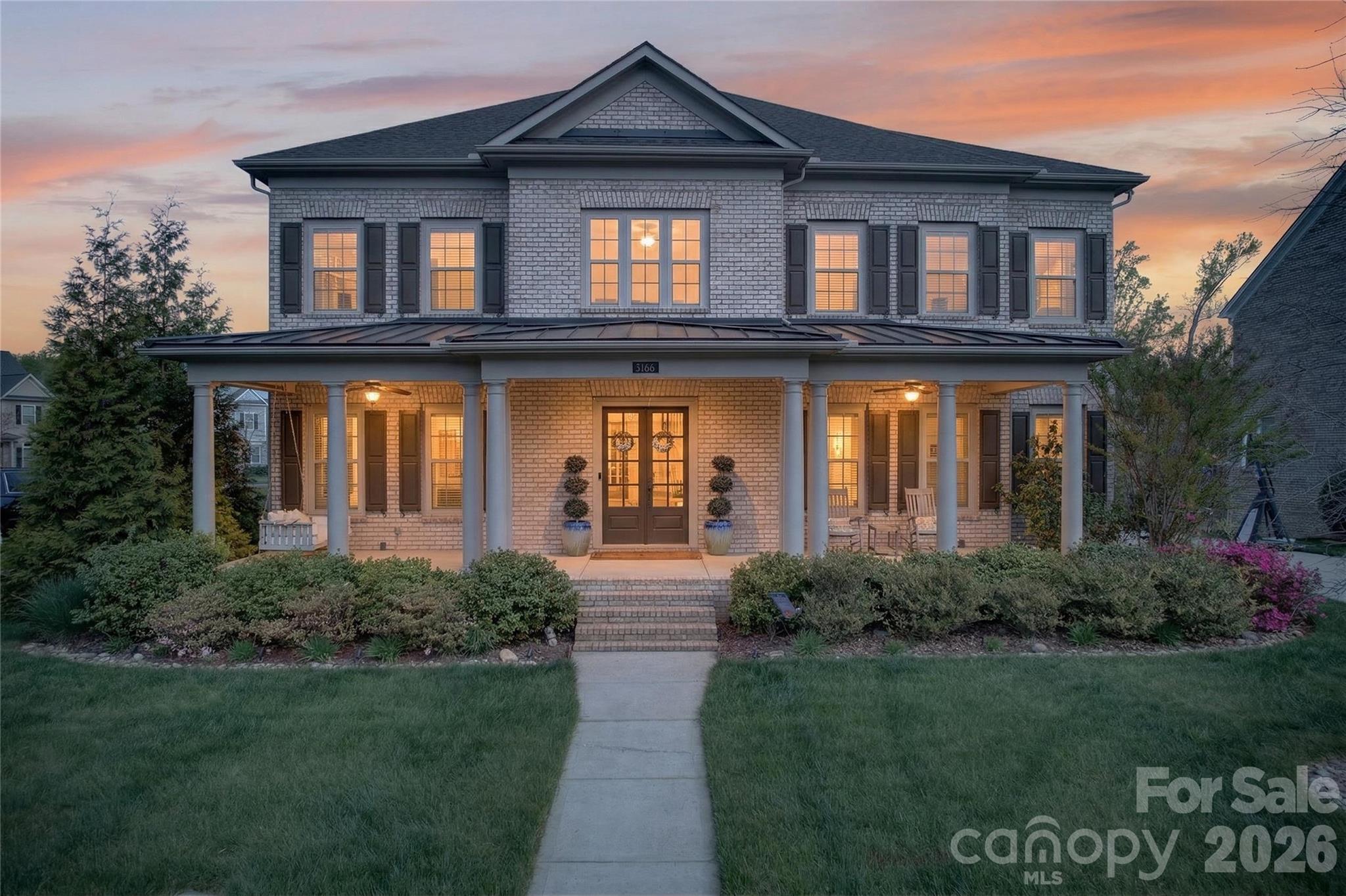 Prepare to be impressed by this custom built all-brick John Wieland basement home in Fort Mill’s desirable community of Habersham.  Grand 2-story foyer with dramatic curved staircase greets guests.  Hardwood floors unite the open concept natural light filled main level.  Gourmet Chef’s kitchen features ample 42” cabinets, double wall oven, wall microwave, beverage fridge, 5 burner gas cook top with exterior venting hood and wine rack.  Integrated breakfast bar seating nook.  Off the kitchen is living room and great room, complete with fireplace & built-in shelving.  Convenient first floor guest suite with en suite bath.  Formal dining room plus generous study, with closet, complete the first floor.  Primary suite is oversized with en suite bath including separate dual vanities, tile encased garden tub, glass enclosed tile shower with double shower heads and enormous walk-in walkthrough closet.  Bedroom 3 has attached en suite bath while bedrooms 4 & 5 are connected by Jack N Jill bathroom.  Open bonus room on second floor plus huge hardwood floor covered loft providing unlimited flexibility.  The fully finished basement impresses with great room and bar area providing unlimited entertaining options.  Basement flex space, presently used as home gym, plus full bedroom six.  Relax on the screened porch or on the lower patio featuring sitting area plus game area.  Fenced flat backyard features mature trees and is ideal for play or entertainment.  3-car garage.  Remarkable community includes pool, clubhouse, playground and walking trails around community pond.  Conveniently located moments from premier shopping, dining & entertainment with award winning Fort Mill school assignments this is an absolute must see!