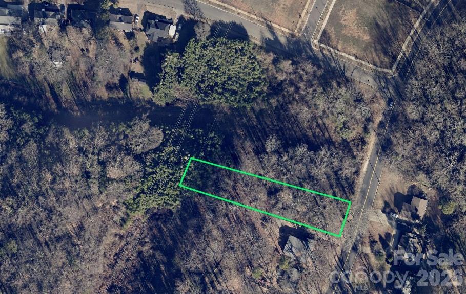 Seller is READY to sell this lot and has authorized another $80,000 price reduction. Over half an acre lot only steps away from Camp Greene Park and everything that this rapidly developing area has to offer.  Convenient to airport, Wesley Heights and just a few minutes from uptown. Lots of new construction in area.  Excellent opportunity to build and unbelievable price for land so close to town.  Please note utility right-of-way along the back of the property.