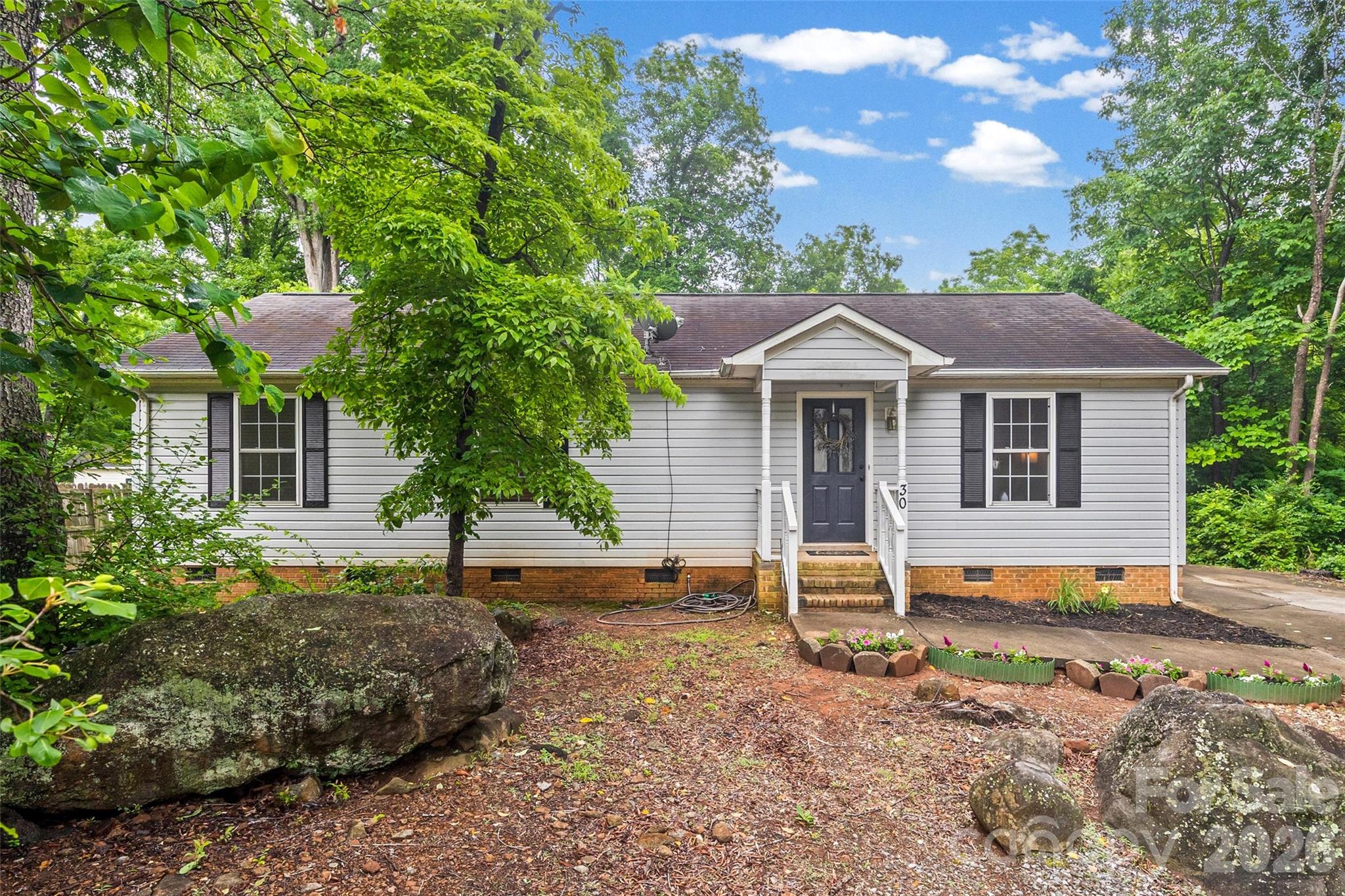 Welcome to this charming, established ranch home in the city of York.  This home features new kitchen and dining area flooring with a spacious open floor plant.  The home has several updates to include new drain pipes installed in 2025 and a new roof that was installed in 2020.  The kitchen offers plenty of room to move around with an ample dining area that supports a large dining table.  The back porch opens to a spacious backyard that includes a storage shed that was built in 2024 and offers a peaceful setting and privacy with a heavily wooded area along the perimeter.  With no HOA, you have the freedom to truly make this property your own.