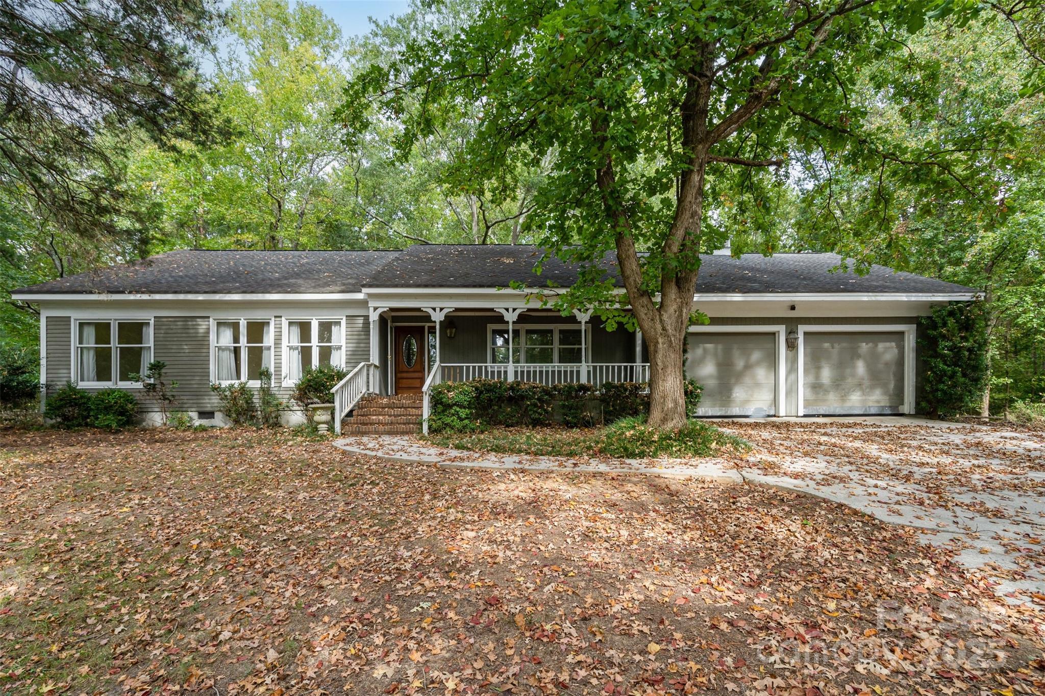 Fantastic opportunity in a highly sought-after location right on the NC/SC line! This 3-bedroom, 2-bath home sits on a generous lot that can be subdivided, creating potential for additional building opportunities. Perfect for investors, builders, or anyone looking for a property with strong upside. The main home offers a traditional floor plan ready for updates, while the separate studio apartment—complete with its own HVAC, kitchen, private access through the garage, and a separate exterior entrance—provides excellent potential for rental income, multigenerational living, or a private guest space. Home is being sold As-Is and does need some exterior work and updating, but the property offers multiple avenues for future value and use. Whether you’re planning to renovate, flip, or build, this one is worth a look!