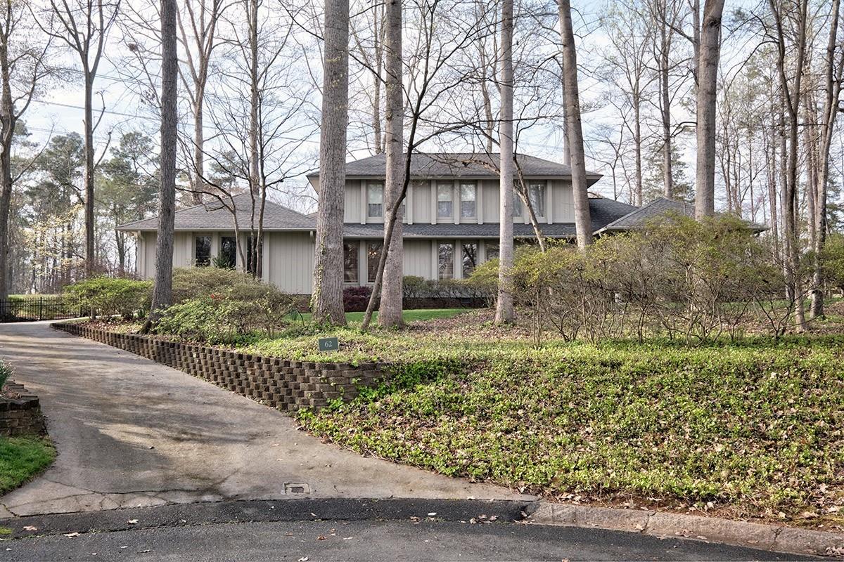 Beautiful and well kept home in gated and 24 hour security neighborhood of River Hills.Home is situated at the end of cul de sac street.Very private!Hardwoods on entire first floor except kitchen area.Large master suite on main with 2 closets and flex space could be office,nursery, or additional huge walk in closet. Formal living room & dining room & oversized great room.Covered rear porch that overlooks awesome yard with tons of flowering plants,bushes and manicured lawn.Bring your porch swing and you are ready! Upstairs features 2 big bedrooms and full bath. Oversized 2 car garage with lots of built in storage. Laundry room has sink in it for dog washing or whatever you need and 1/2 bath.Additional 1/2 bath in foyer. The natural light is so welcoming and lots of windows.Neighborhood features miles of walking trails,marina,country club with 18 hole golf course,waterfront park w/sandy beach,pavilion,paths &swings to enjoy lake views.Home is in the award winning Clover School District!