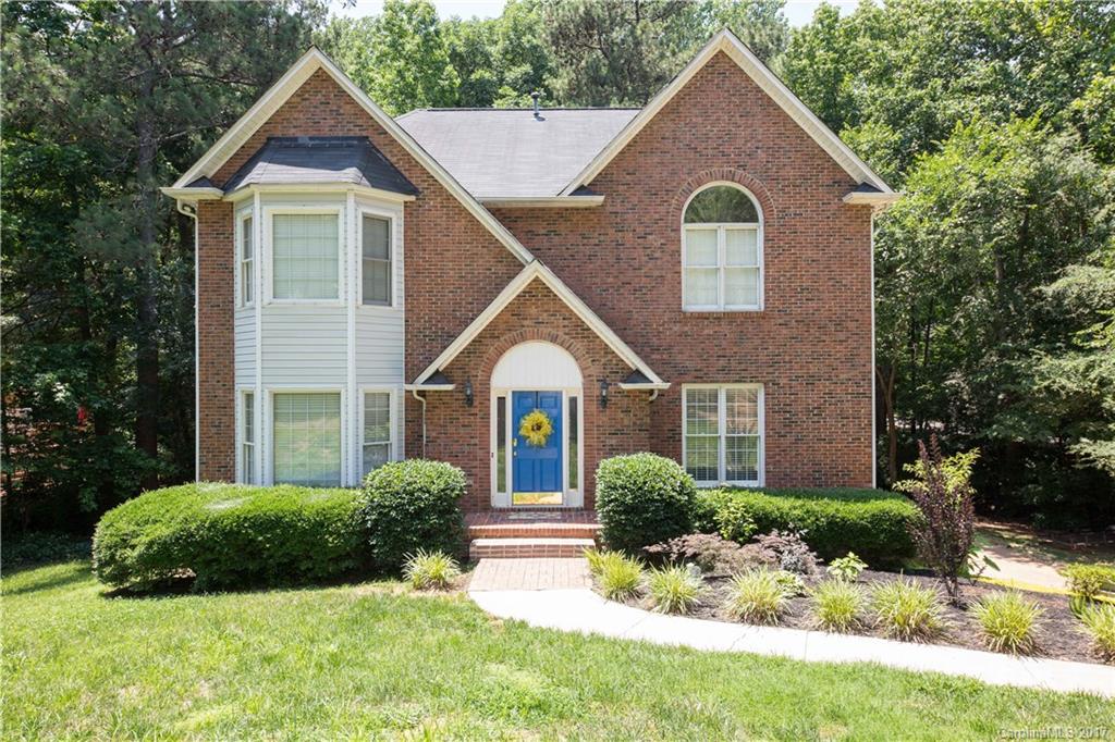 Beautiful 2 story home with finished basement in established & desirable neighborhood. Spacious rooms, hardwoods, granite counters, office formal dining, corner lot that backs up to the woods and offers plenty of privacy! Award winning Fort Mill Schools, minutes to 77 and more!