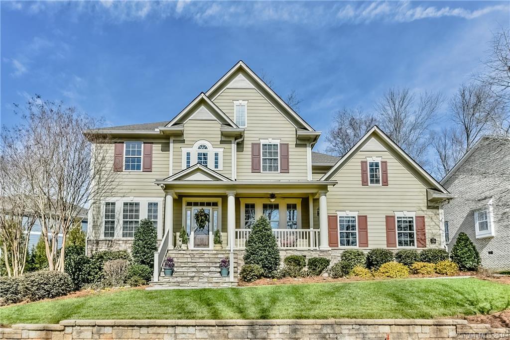 Immaculate 5 or 6 BR/ 4.5 Bath home ( 6th BR could be a bonus room w/ private full bath) w/ private fenced, irrigated yard. Large cook's kitchen w/ island, granite, desk, maple raised panel cabinets & GE Profile appliances. Stacked stone fireplace, stone porch & front steps. Large Master BR suite down. Large office on main level w/ french doors. Hardwood flooring & tile. Great light! Network ready. Many upgrades & open floorplan. Beautifully manicured yard. Short walk to the neighborhood pool!