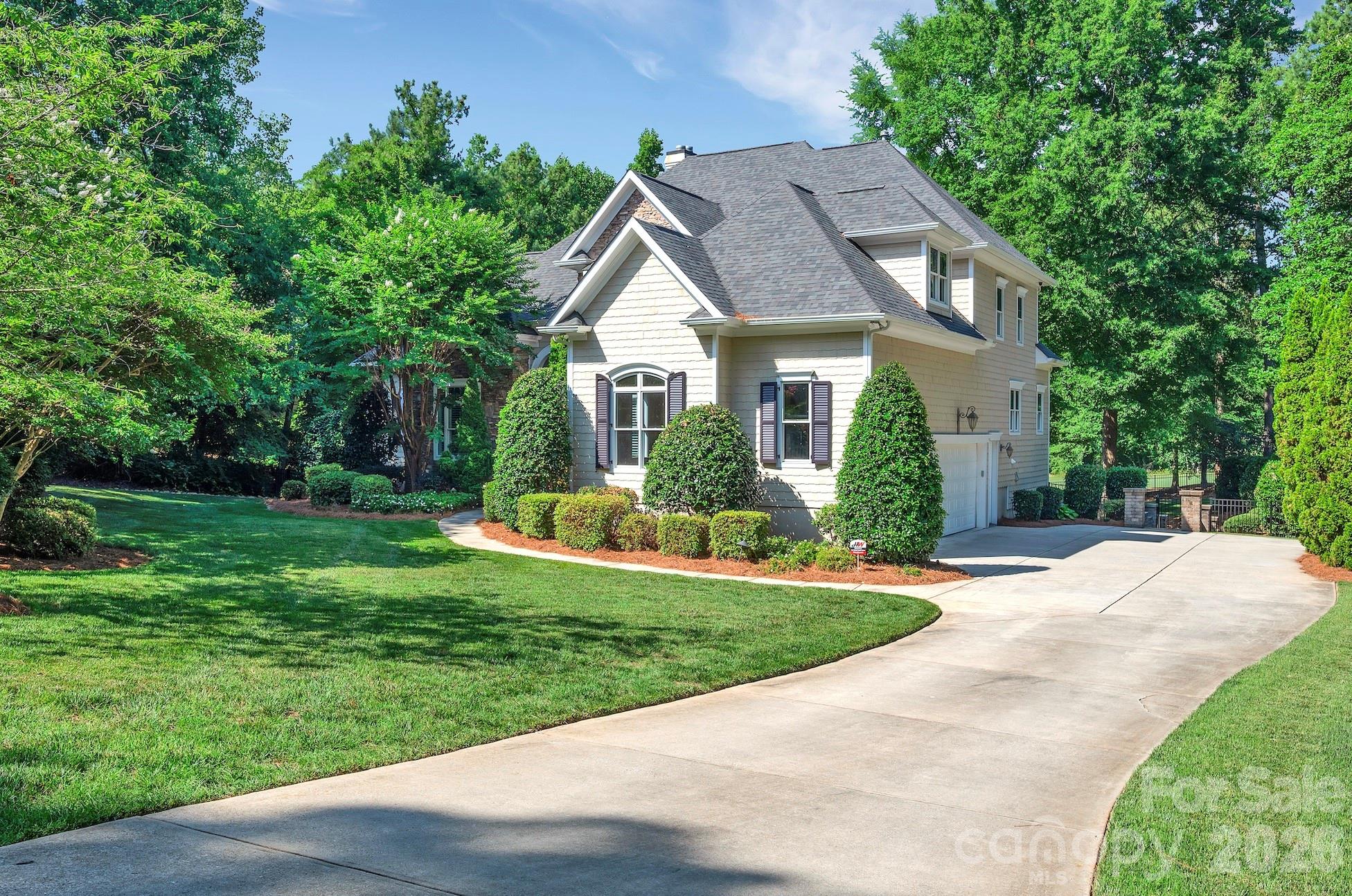 This Well Kept Home is an Entertainers Dream Located on a Private Street with Fantastic Golf Course Views and Includes a Deeded Boat Slip for Access to Lake Norman. New Roof, Gutters and LVP Flooring in the Basement 2023. Every Detail was Thought of When Designing this Well Built Custom Home and You can Really Feel it When Touring in Person. Features Like a Hidden Media Room Access Carefully Crafted Behind the Upper Bonus Room Bookshelves and An Additional Flex Room and Walk in Attic Space for Easy Access. Gorgeous Views of the #2 Fairway and 3 Outdoor Porches to View From. The Basement has a 2nd Fully Equipped Kitchen, Billiard Area an Additional Laundry Hookup and Over 800 Additional Square Feet of Storage Space for Your Lake Toys or Workshop. Control 4 Smart Home System Does it All. Luxury Details Can be Seen Everywhere Including Crown Molding, Judges Paneling, Built Ins, Coffered Ceilings in the Living Room, Trey Ceiling in the Dining Room, Solid Doors and More. Conveniently Located Owner's Suite on the Main Level. Deeded Boat Slip Includes a Lift Located at Slip #6 Pier Z. Making Memories Here is a Breeze with All the Fantastic Getaway Spaces, Degrees of Separation when Needed and Endless Activities From Social Events, Sports, Boating, Golfing or Just Walking / Biking Around Your Gorgeous Community. This is Luxury Lake Norman Living with Great Views Yet Tucked in a Private Drive. We Look Forward to Helping You Make this Your New Place to Call Home.