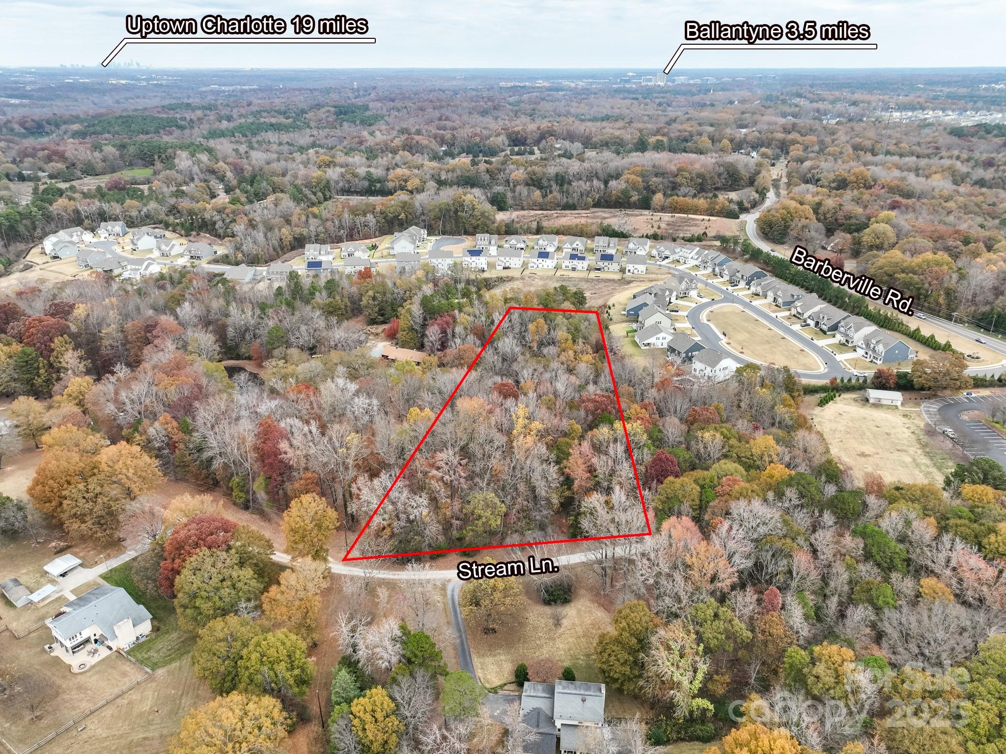 Discover this rare opportunity to build your custom home on 3.12 acres of wooded, private land just off Barberville Road, only minutes to Fort Mill, Ballantyne and shopping in Indian Land. With generous road frontage and a serene natural backdrop, this lot offers both privacy and convenience. A small stream does run through this property adding that remote country feel in such an ideal convenient location.