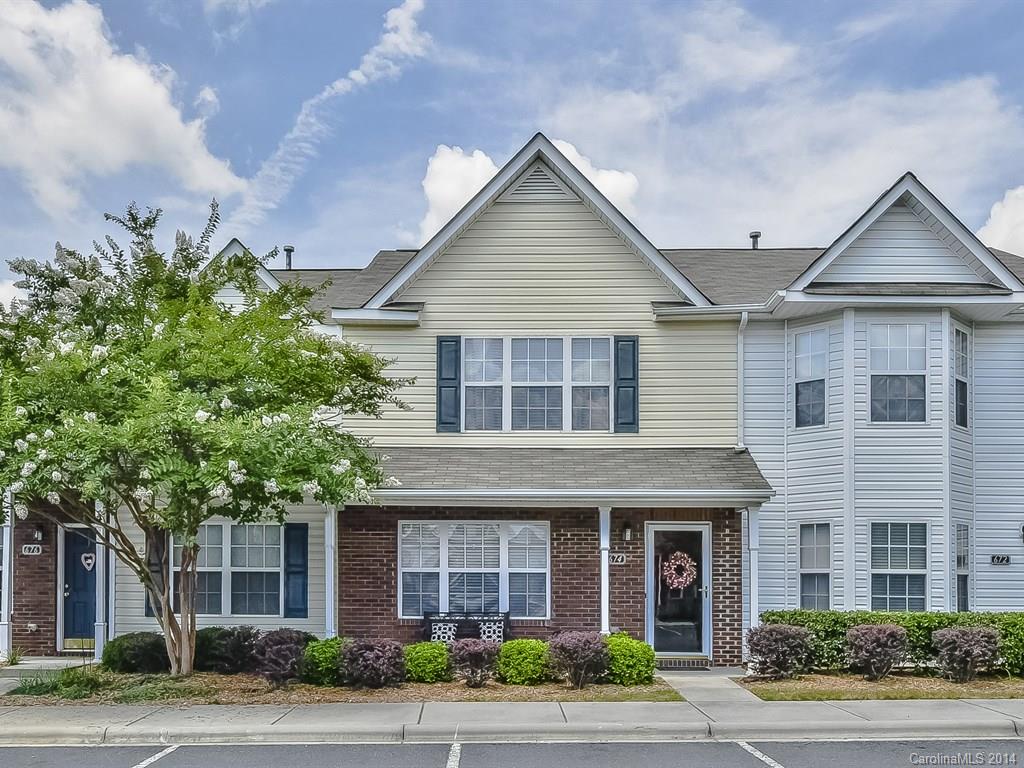 Fabulous Double Master Suite Townhome with charming Front Porch & PRIVATE Enclosed Back Patio!! Gated community with Cubana & Pool. Spacious Great Room with gas fireplace flows into Dining Area and adorable Kitchen with work island. Both Master Suites with vaulted ceilings, double sinks and walk-in closets. Full Laundry Room & closets galore, including outdoor storage closet. Perfectly located near I-77 and in award winning Fort Mill School District!