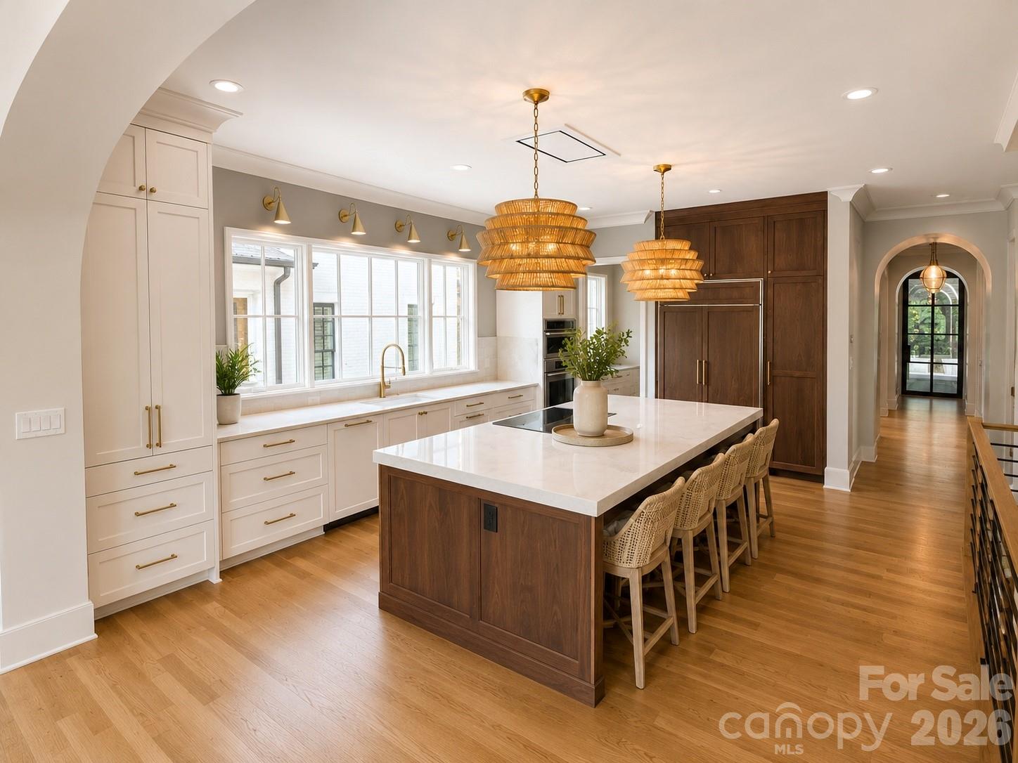 A truly rare opportunity to own both sides of a luxury duet in the heart of Myers Park, creating a private compound on nearly half an acre in one of Charlotte's most desirable neighborhoods. Offering exceptional flexibility and versatility, 1214 S Kings Drive presents a unique ownership opportunity rarely available within the urban core.

Together, Units A and B provide the privacy of separate residences while offering the convenience of being located side by side. Unit A offers a thoughtfully designed blank canvas, allowing the next owner to personalize finishes and create a space tailored to their vision. The outdoor living experience is equally impressive, featuring a private pool and hot tub that create a resort-inspired setting for relaxation and entertaining. Unit B showcases a fully customized residence with elevated selections, refined finishes, and carefully curated design details throughout.

The dual-residence configuration opens the door to countless possibilities, including guest accommodations, home office space, creative studios, long-term visitors, private retreats, investment strategies, or a combination of uses that evolve over time. Few properties offer this level of flexibility while maintaining a cohesive and elegant living environment.

Ideally situated just moments from Myers Park's iconic tree-lined streets, the Greenway, Uptown Charlotte, premier dining, boutique shopping, and cultural attractions, this offering combines location, lifestyle, and versatility in a way that is exceptionally difficult to replicate. A distinctive property designed to adapt to your needs today while offering enduring value for years to come.