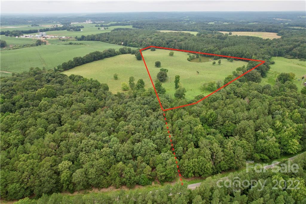 BEAUTIFUL tract of land offering many uses. This 14 acre tract offers all the privacy you want. Bring a builder to this lot or keep in the farm program. Well and septic needed. Cannot be subdivided. This beautiful tract also has a pond.  Also selling 14+/- acre next door. MLS:3887772 Shared road with adjacent 14 acre lot will need to be completed. There is currently a small driveway in place.