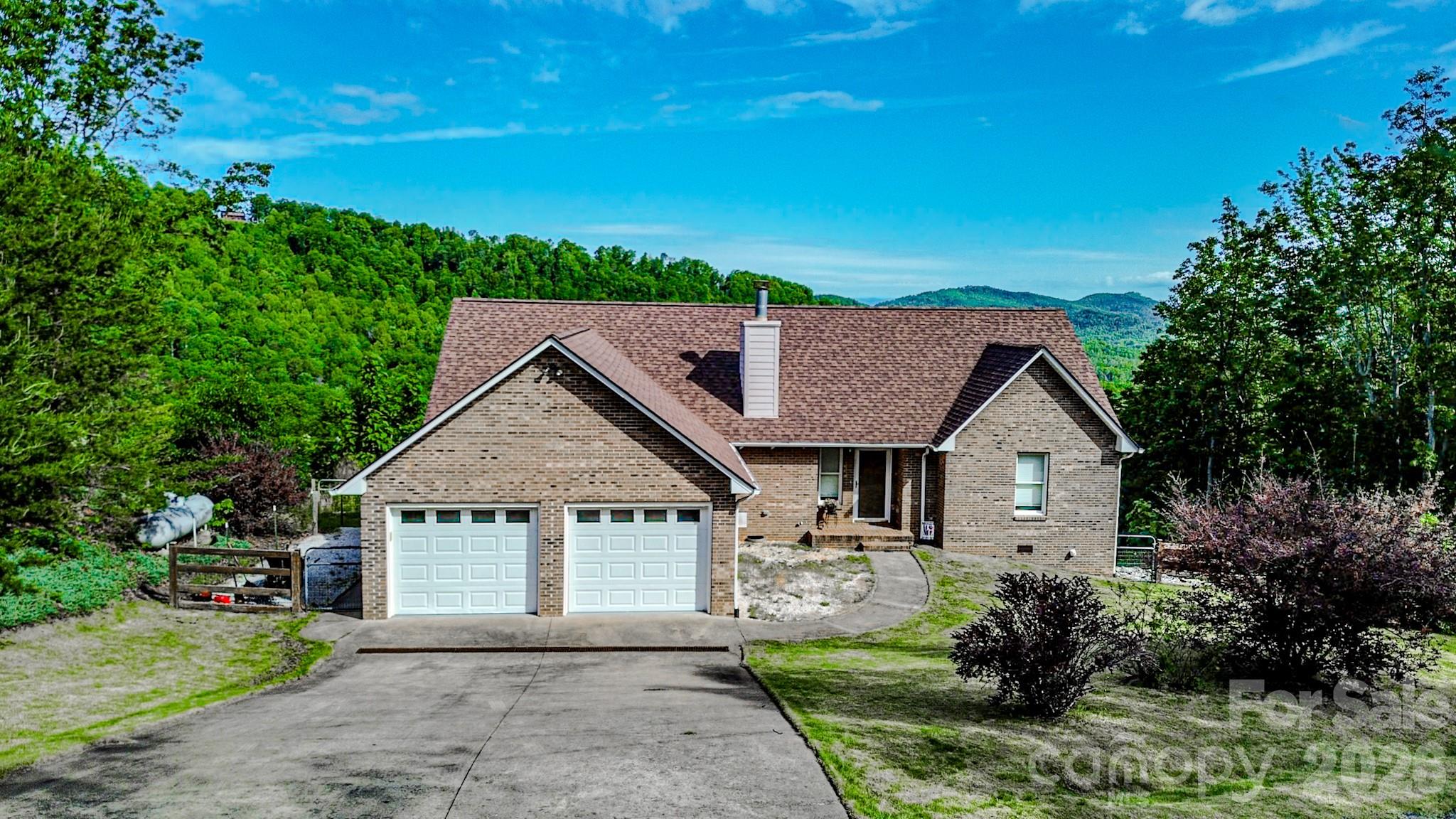Enjoy long-range mountain views from this 3BR/2BA brick home situated on 5.81 private acres in Golden Valley Estates.

Now offered at $359,900, this property delivers the mountain setting buyers want with the practical updates and features they need. With approximately 1,530 SF of one-level living, a 2-car attached garage, 2024 architectural roof, and whole-house generator, the home is positioned as a strong value for buyers seeking privacy, durability, and everyday comfort.

Inside, you’ll find a fireplace, vinyl plank flooring, included kitchen and laundry appliances, and a functional layout designed for easy living. Additional features include paved road access, well and septic, and a peaceful scenic setting surrounded by nature.

A solid opportunity for buyers looking for mountain views, acreage, privacy, and move-in-ready convenience at a newly updated price of $359,900.