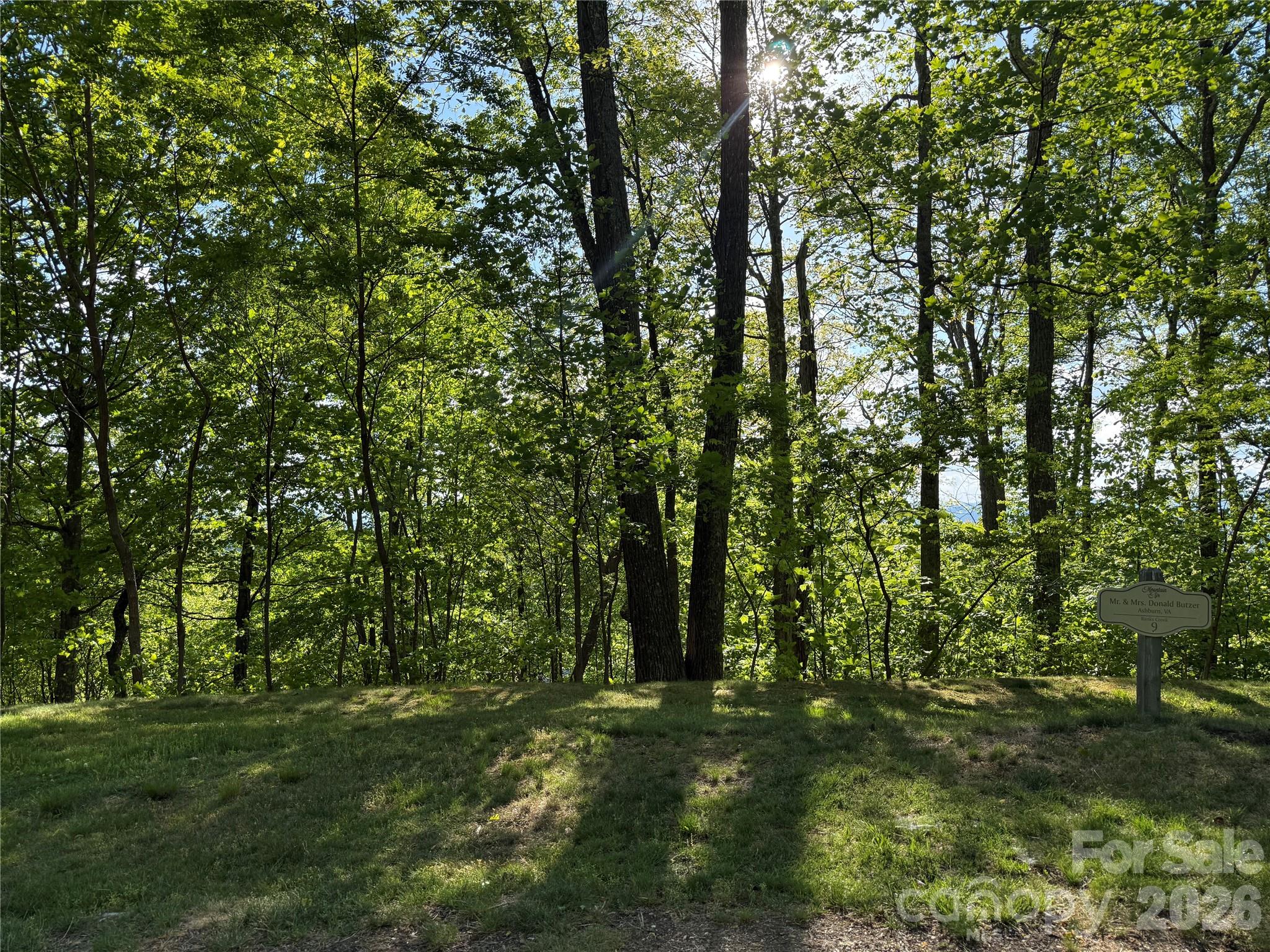 Two premier, adjoining homesites at MOUNTAIN AIR, being offered together with approximately 1.5 acres (combined) with outstanding western exposure, incredible sunsets, long-range mountain views and valley views. Located on Andrew Banks Road, this is an excellent building location! All utilities are underground. Because these are TWO individual parcels, the POA monthly fee of $300.00 applies to each individual lot. However, there is the potential to combine those lots, with POA approval. Easy access to all of Mountain Air amenities, including: Golf, pickleball, hiking, tennis, state-of-the-art fitness center, Spa, outdoor heated pool, Clubhouse, dining, Mountain Market, and more, available with separate membership. More than 6 miles of hiking trails, 7 parks, and a private runway with the highest airstrip east of the Mississippi, are available to all property owners.
