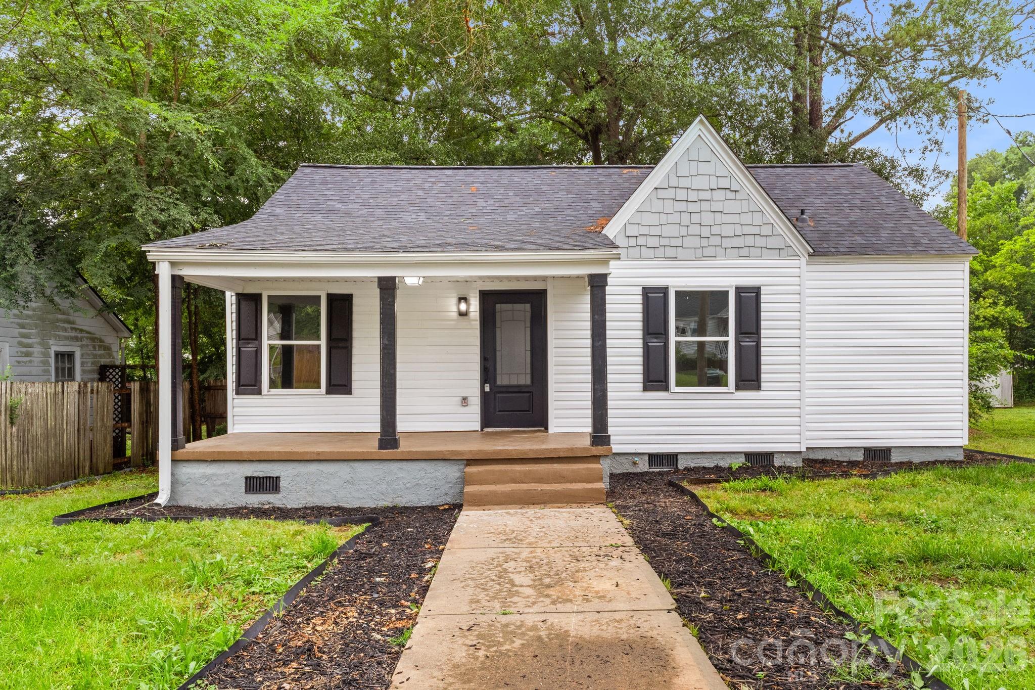 1st Time Homebuyer GEM** Completely remodeled and truly move-in ready, this beautifully updated 2-bedroom, 2-bath home with LVP flooring throughout, delivers the perfect blend of modern style, comfort, and peace of mind. Thoughtfully renovated from top to bottom, major upgrades include all-new plumbing, electrical updated in 2024, HVAC replaced in 2023, and a brand-new roof installed in 2025.
The designer-inspired kitchen is the heart of the home, featuring sleek finishes, abundant cabinetry, and a spacious island ideal for entertaining, gathering, or everyday living. Step outside and enjoy the brand-new deck, perfect for grilling and relaxing, or sip your morning coffee on the charming covered front porch.
Located just minutes from historic downtown Chester, this home offers the best of quiet rural living with small-town charm, affordability, and modern convenience. If you’re looking for stylish, low-maintenance living in a peaceful setting, this one checks every box.