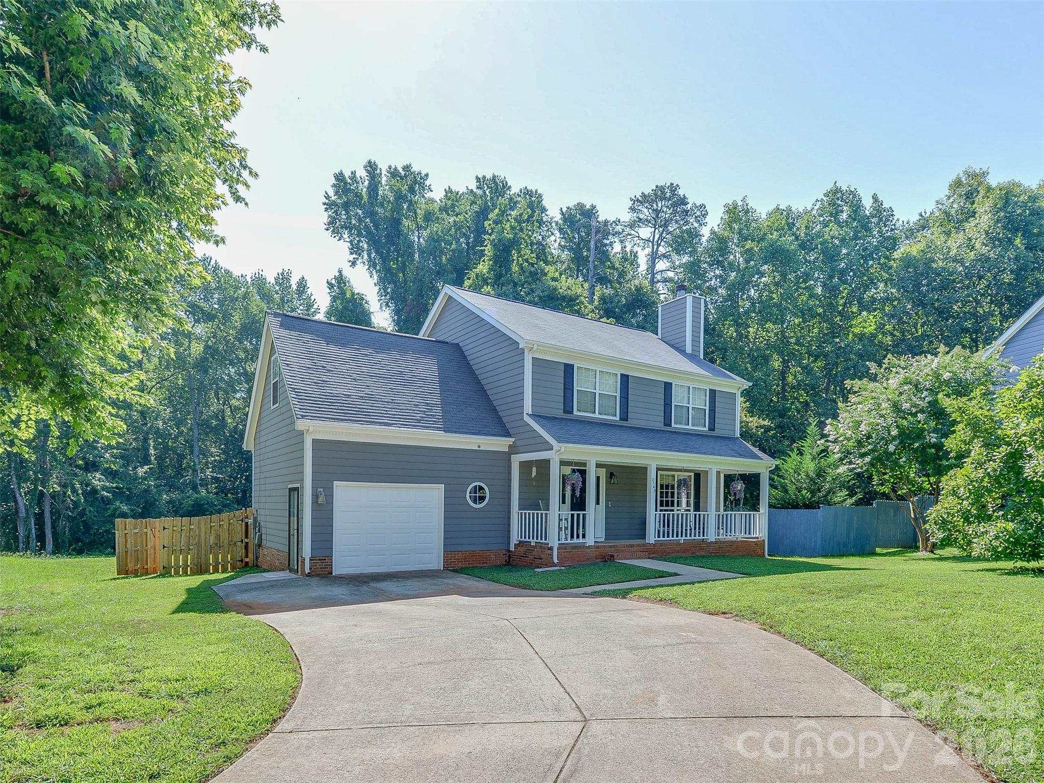 Welcome home to this Cul-de-sac stunner located so close to everything!  This charmer has some special features you won't find in other homes!  Beat the heat in this deep-center large pool plus portable hot tub and lounge with friends on the extra large back deck. The garage was converted to a spacious bonus area that can be used for many things (giant entertaining area/cave, home based business, gym, etc, etc) complete with an extra half bath.  This great floor plan features a large living room with real wood burning fireplace and dining room.  The kitchen has plenty of countertops and storage while overlooking the stunning pool!  Upstairs is another bonus room being used as a bedroom, two more bedrooms and the owner's suite.  The thoughtfully designed vaulted ceiling adds drama to the great sized room.  Complete with walk in closet and en suite bath.  Besides the pool and multi tiered deck, rocking chair front porch and check out the large fully fenced yard with the added bonus of HOA owner land behind it for the ultimate privacy.  Enjoy all the great storage options between the shed (10 X 16 with loft), tall crawl and attic space!  Electric panel was updated as well!  All of this and more just minutes to 77,85, shopping, dining and so much more!  Multiple parks and nature preserves nearby! Recent updates include new vapor barrier, vents, fans, some appliances and more.  Showings start July 21st.  HOA is only $161.06 a year!