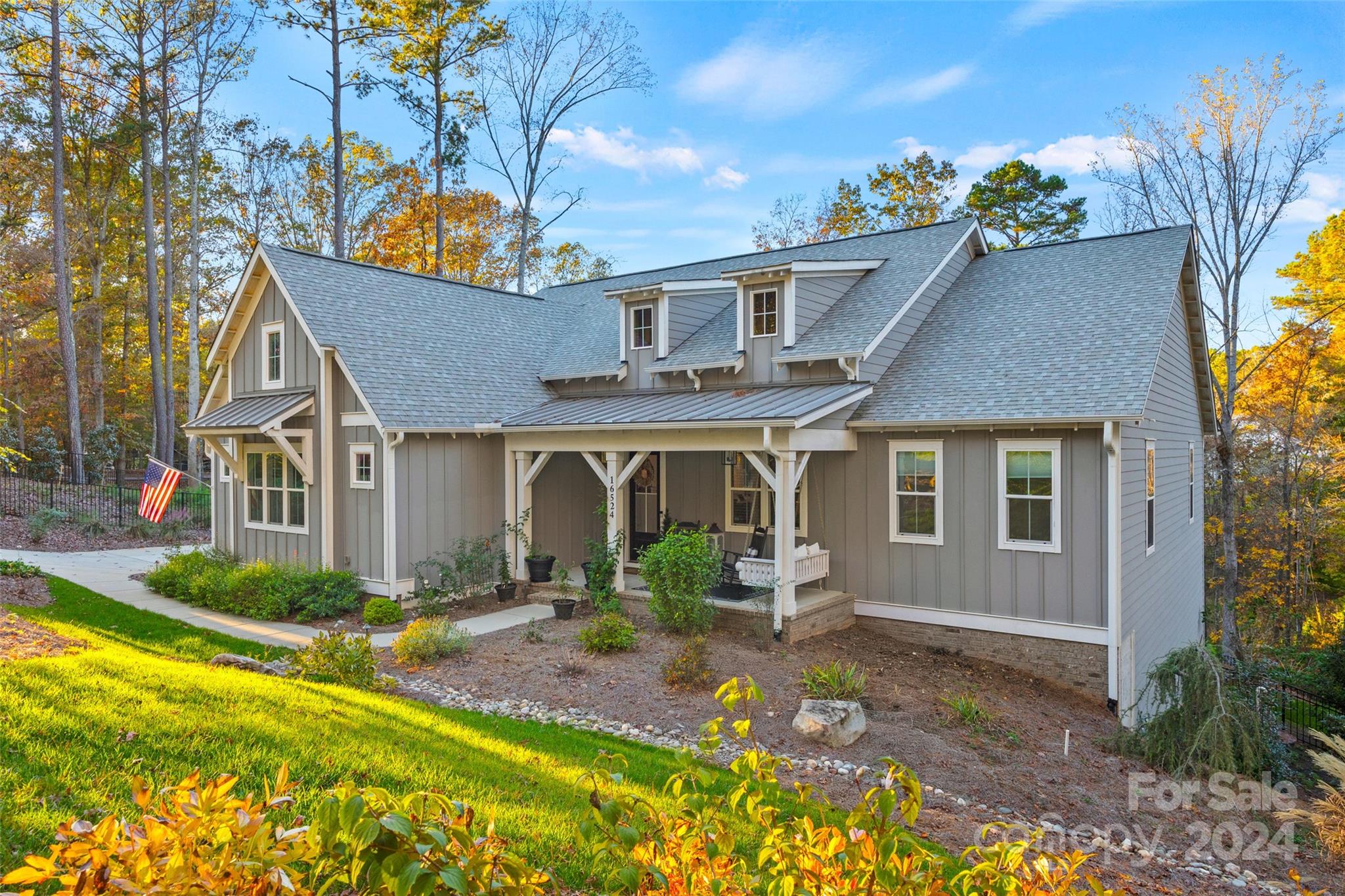Don't miss this opportunity to live with LKW as your backdrop! Ranch home with finished basement offers lake and wooded views from every room. 2 outdoor patios perfect for entertaining. Open main floor boasts designer touches, with a chef's kitchen and gas fireplace in the family room. Expansive basement opens up countless lifestyle options, with space for gaming tables, gym, family room, or dining. Vast storage room offers space for your items PLUS room for a golf simulator, wine/bourbon room, or play area. The 3-car garage offers space for all of the fun things- golf cart, ATV, whatever your heart desires. Privacy abounds, with the Catawba Lands Conservancy across the street ensuring preserved natural beauty. Just a golf cart ride away from the prestigious Palisades Golf Community. **Per FEMA, NO flood insurance is required as this home is not in a flood hazard. The SFHDF from FEMA is available.