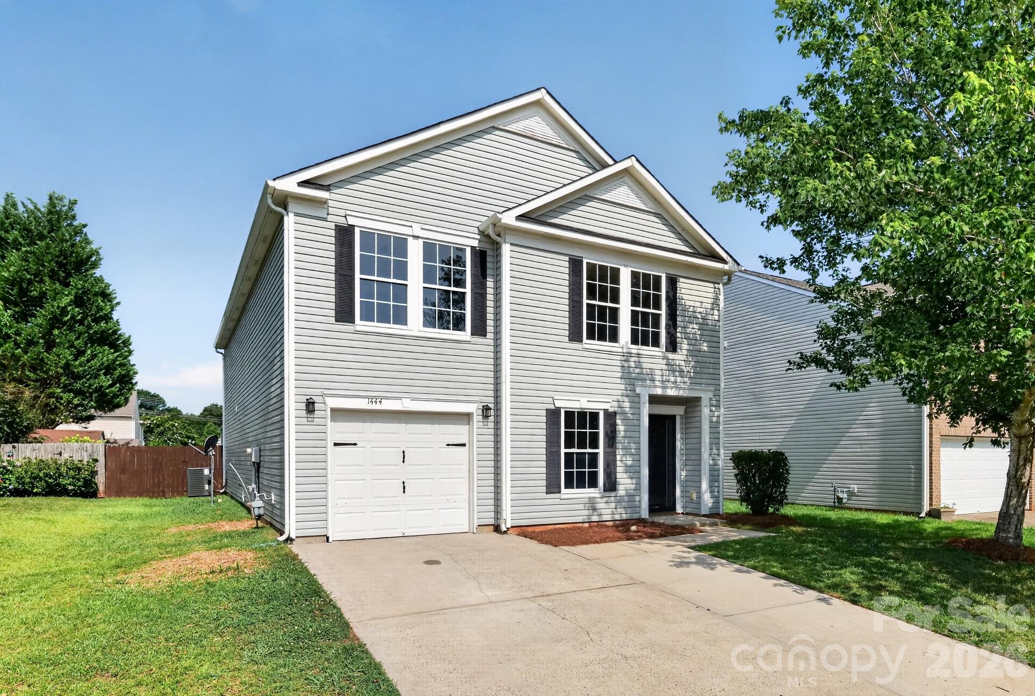 This inviting 3-bedroom, 2.5-bath home offers a bright, open-concept layout designed for comfortable everyday living. The spacious kitchen features stainless steel appliances, ample cabinet space, and a center island that flows seamlessly into the large living area with a cozy fireplace. With generous natural light, a functional floor plan, and plenty of room to gather, this home is ready for its next owner to make it their own.