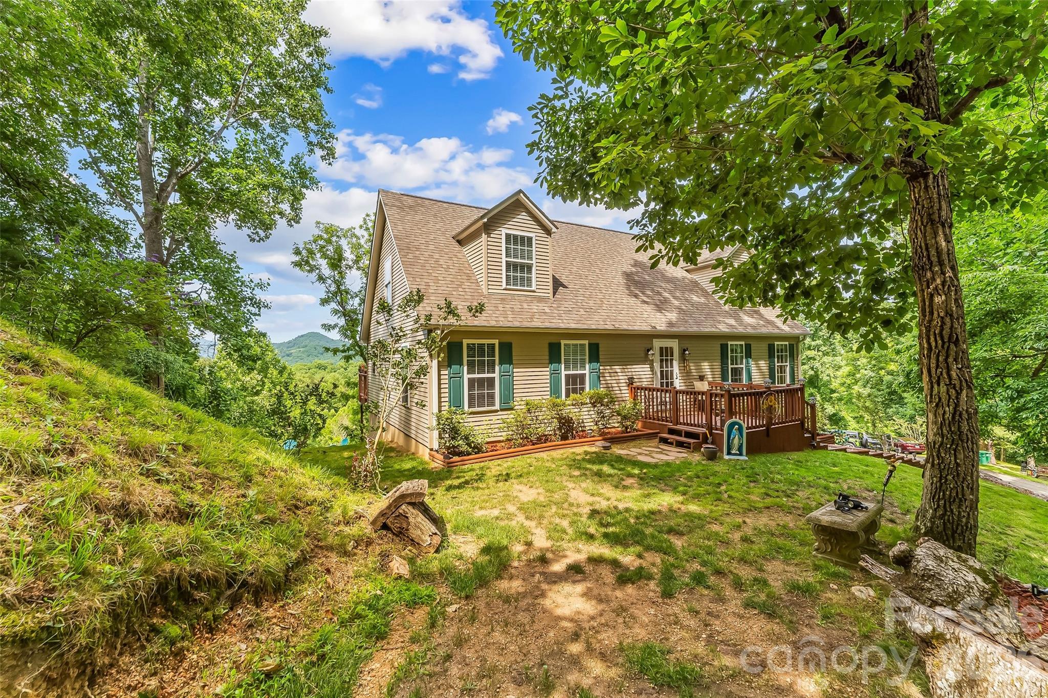 Perched high atop a mountain, this stunning three-bedroom, two-bath home with a bonus room offers breathtaking 360° mountain views that truly set it apart. Nestled on over 10 acres, the property features a perfect blend of open pasture and wooded land, providing both privacy and versatility.

There is a 2 car attached garage and 1344 sq. ft. unfinished basement that allows for additional living space.

Inside, you’ll find a warm and inviting layout with plenty of space to relax or entertain. The bonus room adds flexibility for a home office, guest space, or recreation area. Whether you’re enjoying peaceful mornings overlooking the rolling mountains or exploring your own private acreage, this property delivers the ideal mountain lifestyle.

This home is ready for you to make it your own and enjoy everything nature has to offer—space, serenity, and unforgettable views. There is also an additional home site nestled on the 10.02 Acres.
You need to come and drive this Beautiful property in it’s entirety!  Don’t let this one slip away!