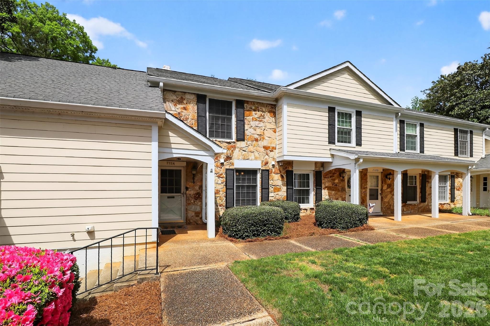Enjoy easy, low-maintenance living in the highly sought-after Quail Hollow SouthPark location! This beautifully updated condo features a bright, open layout with stylish laminate wood flooring throughout the main level, creating a warm and inviting atmosphere from the moment you enter. Upgrades include neutral interior paint and sleek granite countertops in both the kitchen and powder room, giving the space a clean, modern feel. Upstairs offers generously sized bedrooms with newer carpet, along with 1/2 bath, and updated full bathroom showcasing tiled tub surround, granite-topped vanity, and contemporary light fixtures that complete the look. The benefits extend beyond the home itself with fantastic community amenities including tennis courts, an outdoor pool, clubhouse, walking trails, and a scenic pond, offering a lifestyle of comfort and convenience. Even better, the HOA covers heating and cooling maintenance, helping simplify expenses and everyday living. If you’re looking for a move-in ready condo that combines style, value, and convenience, this one is not to be missed!