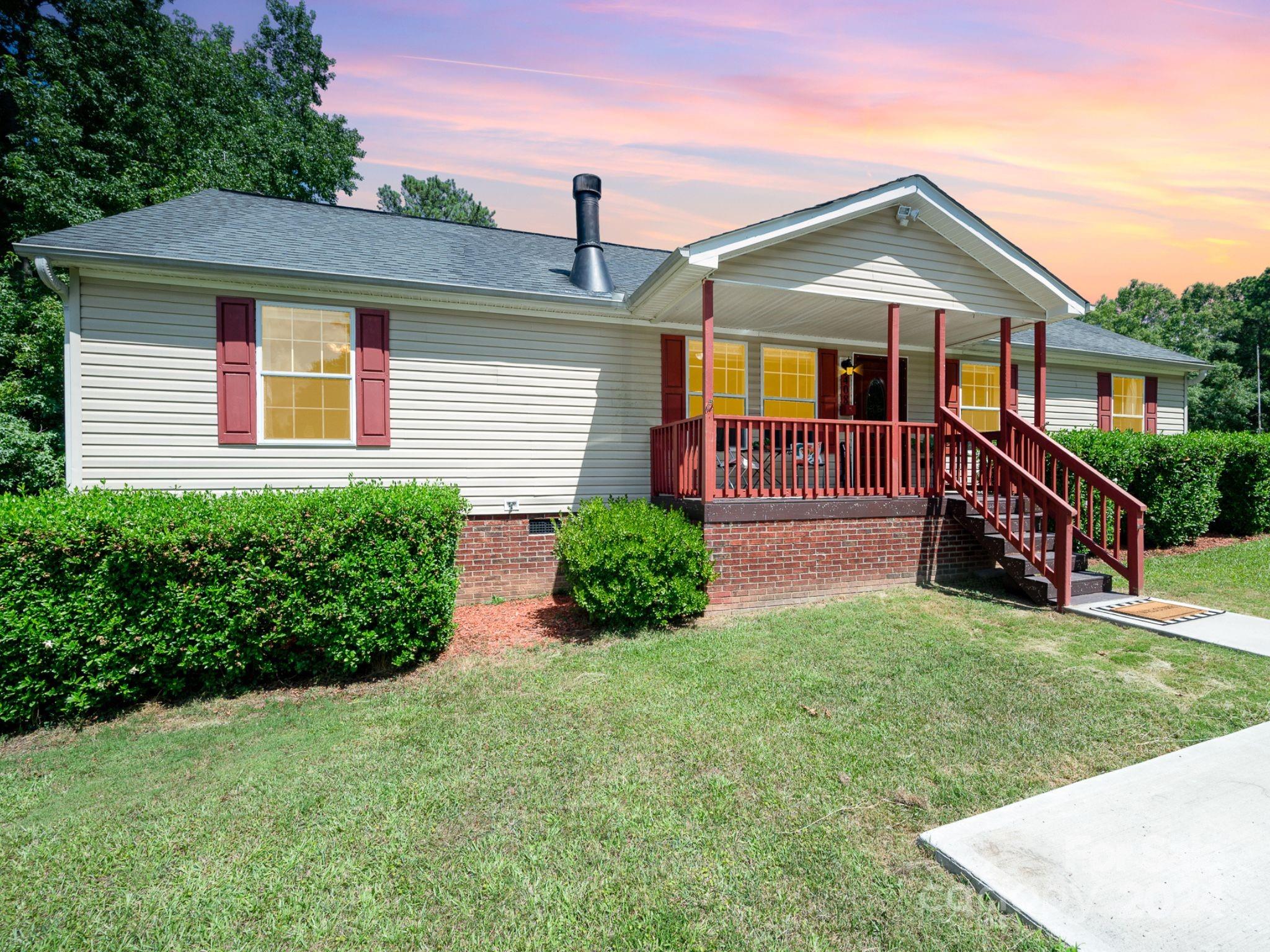 This beautiful ranch style home in a quiet neighborhood is a real charmer and ready for its new owners! Sitting on almost 1 acre with no HOA. Great outdoor space which includes a welcoming front porch and a back porch perfect for entertaining. The primary bedroom offers plenty of storage and the primary bathroom has been updated.  There are two additional bedrooms with large closets. The floorplan flows easily into a spacious dining room and living area that leads to the kitchen and laundry area. Prime location within a short drive to downtown York, and easy access to Rock Hill, Clover, Gastonia and Charlotte. This charming home offers a peaceful setting, and spacious living and dining areas, with 3 bedrooms and 2 full bathrooms.  The shed in the backyard conveys with the property and it is great for additional storage.  Schedule a tour today!