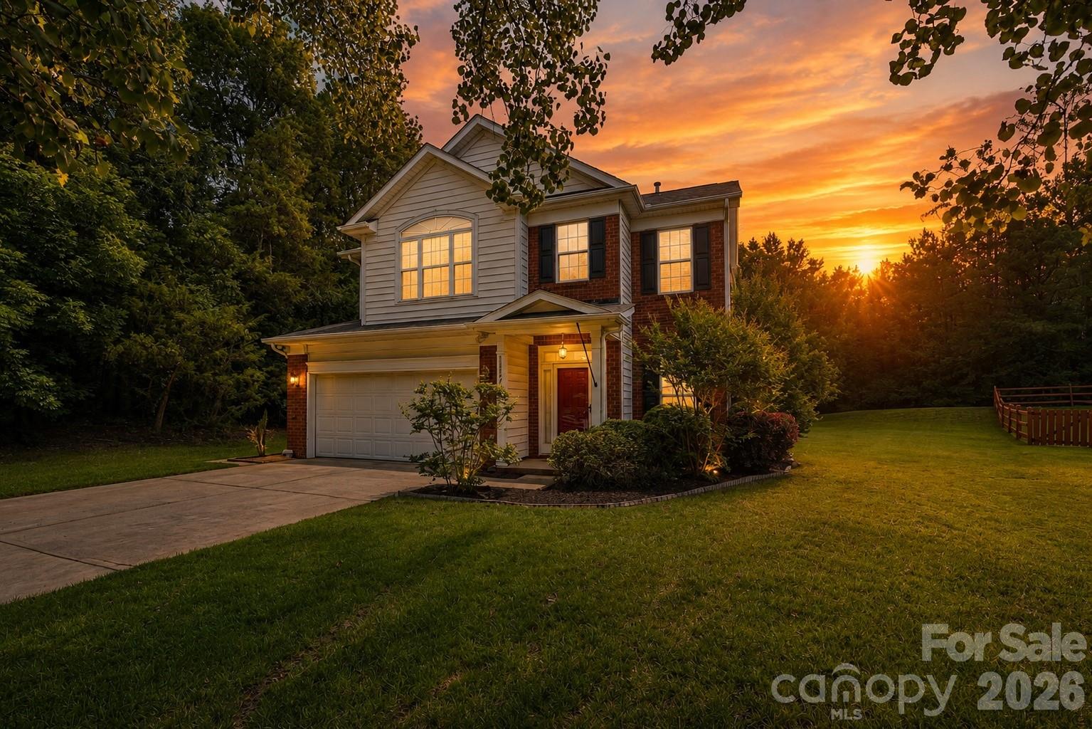 Tucked away on a peaceful cul-de-sac in Steelecroft Place, this inviting two-story home offers the perfect blend of comfort, privacy, and convenience. A welcoming foyer opens to a free-flowing floor plan featuring beautiful wood floors throughout the main living areas and a striking double-sided fireplace that creates a warm connection between the living room and dining room.

The kitchen is designed for both everyday living and entertaining, featuring a center island, gas range, breakfast nook, and clear views of the backyard so you can enjoy the scenery while cooking or gathering. A conveniently located half bath completes the first floor.

Upstairs, you'll find all four bedrooms along with the laundry room, providing a practical and functional layout. The spacious primary suite offers a peaceful setting with views of the surrounding trees, creating a relaxing retreat at the end of the day.

Step outside to enjoy the private backyard oasis, complete with a patio and fire pit—perfect for quiet evenings, entertaining guests, or simply appreciating the peaceful surroundings. Unlike many neighborhoods, this lot offers a greater sense of space, with neighboring homes not immediately behind you and attractive fencing that enhances the view while maintaining privacy. In the evening, the home's illuminated windows create a warm and welcoming glow that highlights its charm.

Adding to the appeal, a walking path just steps away connects Michael Lynn Road to DeHavilland Drive and the next section of Steelecroft Place, providing a short and safe walk to the neighborhood pool. The surrounding streets and paths also create an ideal environment for riding bikes, taking walks, and enjoying the neighborhood's friendly atmosphere.

This home offers the rare combination of privacy, wooded views, neighborhood amenities, and a location that truly feels tucked away while remaining connected to everything Steelecroft Place has to offer.