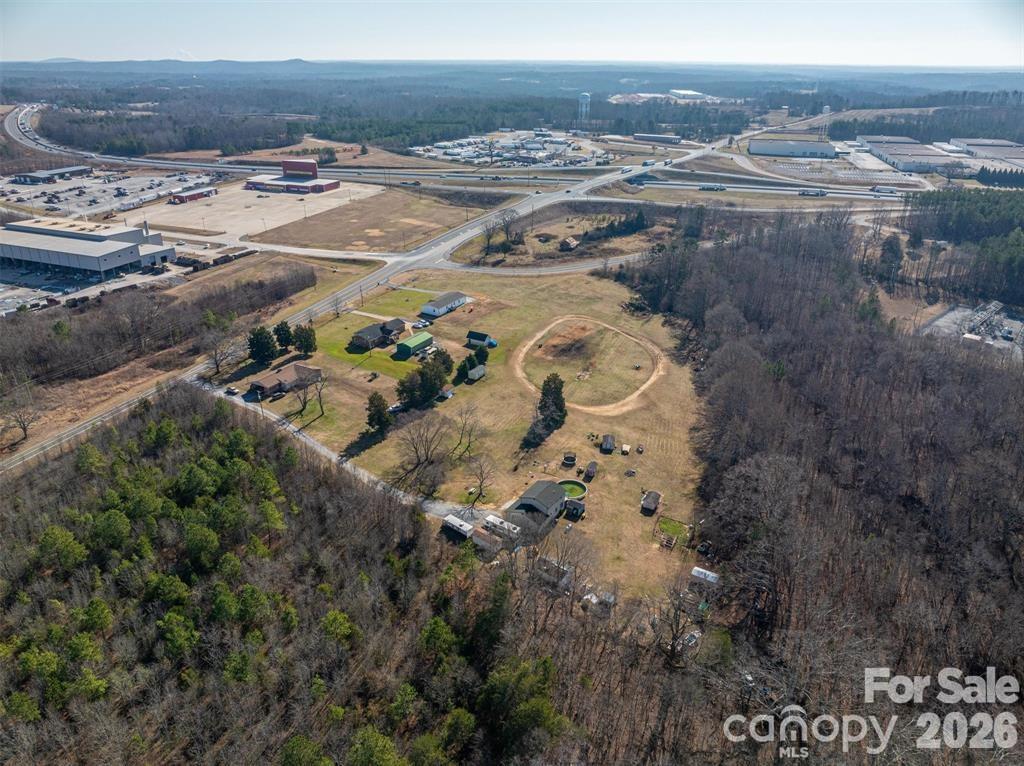 Prime Development Opportunity:  Approximately 46.5 Acres Located approximately 800 feet off I-85 Exit 104 at Tribal Rd. Property consist of 10 parcels all being sold together and includes 4 stick built homes and two manufactured homes. Approximately 900 feet of road frontage. County water and sewer being installed per sellers and will be accessible along Tribal Rd. Conveniently located approximately 6 miles from Catawba Two Kings Casino. Excellent potential for residential development, industrial, or mixed use. 

Do Not Disturb Tenants or Owners. You MUST have an appointment to see property.