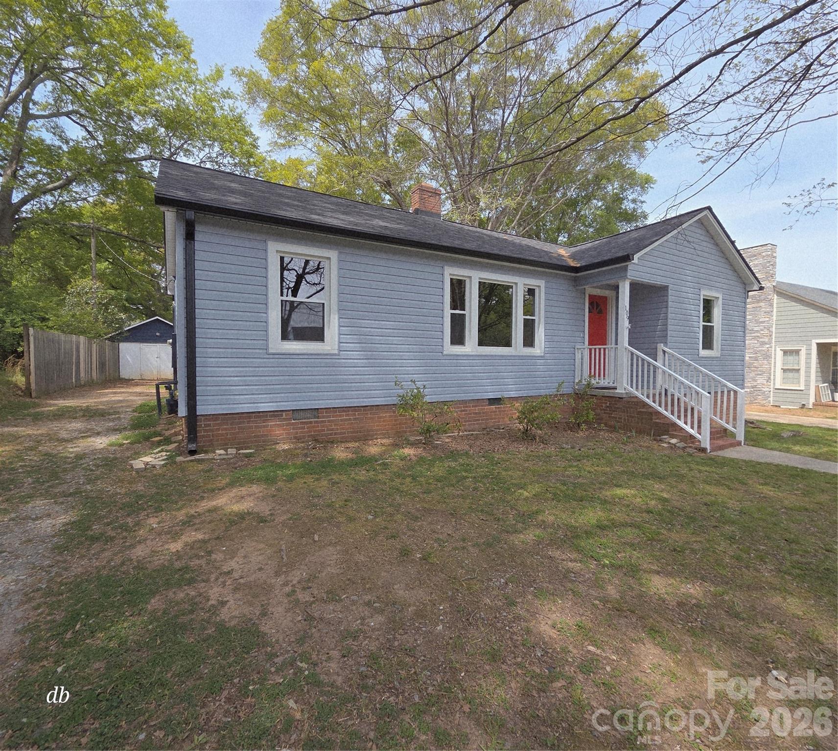 Quaint and charming home ideally located approximately 5 blocks from the vibrant Uptown Shelby area—home to popular restaurants, shops, bars, and the Don Gibson theatre and the Earl Scruggs Museum. The nearby rail-trail expansion further enhances walkability and outdoor recreation options.

This inviting home offers numerous updates including new siding (2026), a recent roof (2022), fresh interior paint (2026), and new kitchen flooring (2026). The spacious living room features a classic fireplace, creating a warm and welcoming focal point. 

Interior highlights include beautiful hardwood floors, a functional layout, and a kitchen with abundant cabinetry. A screened porch provides additional living space ideal for relaxing or entertaining.