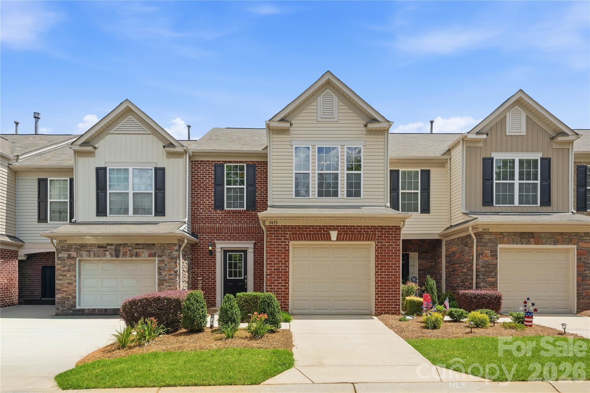 Welcome to 2433 Diplomat Lane, Charlotte, NC 28210, where modern comfort meets effortless living in the highly sought-after gated community of Park South Station. This beautifully maintained, move-in-ready townhome offers 1,634 square feet of thoughtfully designed living space with 3 bedrooms, 2.5 bathrooms, and an open-concept floor plan perfect for both everyday living and effortless entertaining.

At the heart of the home, you'll find a stunning kitchen featuring upgraded stainless steel appliances, granite countertops, a subway tile backsplash, abundant cabinetry, and a spacious breakfast bar that seamlessly overlooks the inviting living and dining areas. Rich hardwood floors, elegant moldings, stylish finishes, and an abundance of natural light create a warm, sophisticated atmosphere throughout.

Upstairs, the spacious primary suite provides a private retreat with a tray ceilings, a walk-in closet, and en-suite bath, while two additional bedrooms offer the perfect space for guests, a home office, or flexible living.

Enjoy the exceptional lifestyle that makes Park South Station one of South Charlotte's most desirable communities. Residents have access to resort-style amenities including a gated entrance, clubhouse, fitness center, swimming pool, dog park, playground, sidewalks, and beautifully maintained green spaces.

Ideally located in the heart of South Charlotte, you're just minutes from SouthPark, Park Road Shopping Center, Montford Drive, the Little Sugar Creek Greenway, South End, Uptown Charlotte, major hospitals, top employers, and convenient access to the Lynx Blue Line Light Rail. Whether you're a first-time buyer, busy professional, or someone looking for a low-maintenance, lock-and-leave lifestyle, this home delivers the perfect combination of style, convenience, and location.

Don't miss your opportunity to own in one of Charlotte's most desirable gated communities. Schedule your private showing today and experience everything 2433 Diplomat Lane has to offer.