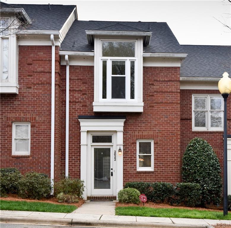 Amazing full brick condo available in Dilworth Heights! Open concept floorplan has hardwoods running through main level. Kitchen hosts white cabinets, granite counters, recessed lighting and SS appliances. Living room features gas log fireplace and tons of natural light. Bedrooms upstairs both have huge closets and attached full bathrooms. Enjoy the outdoors with privacy on the enclosed patio with storage shed. Freshly painted! Washer, dryer & fridge remain! Close to lots of shops & restaurants!