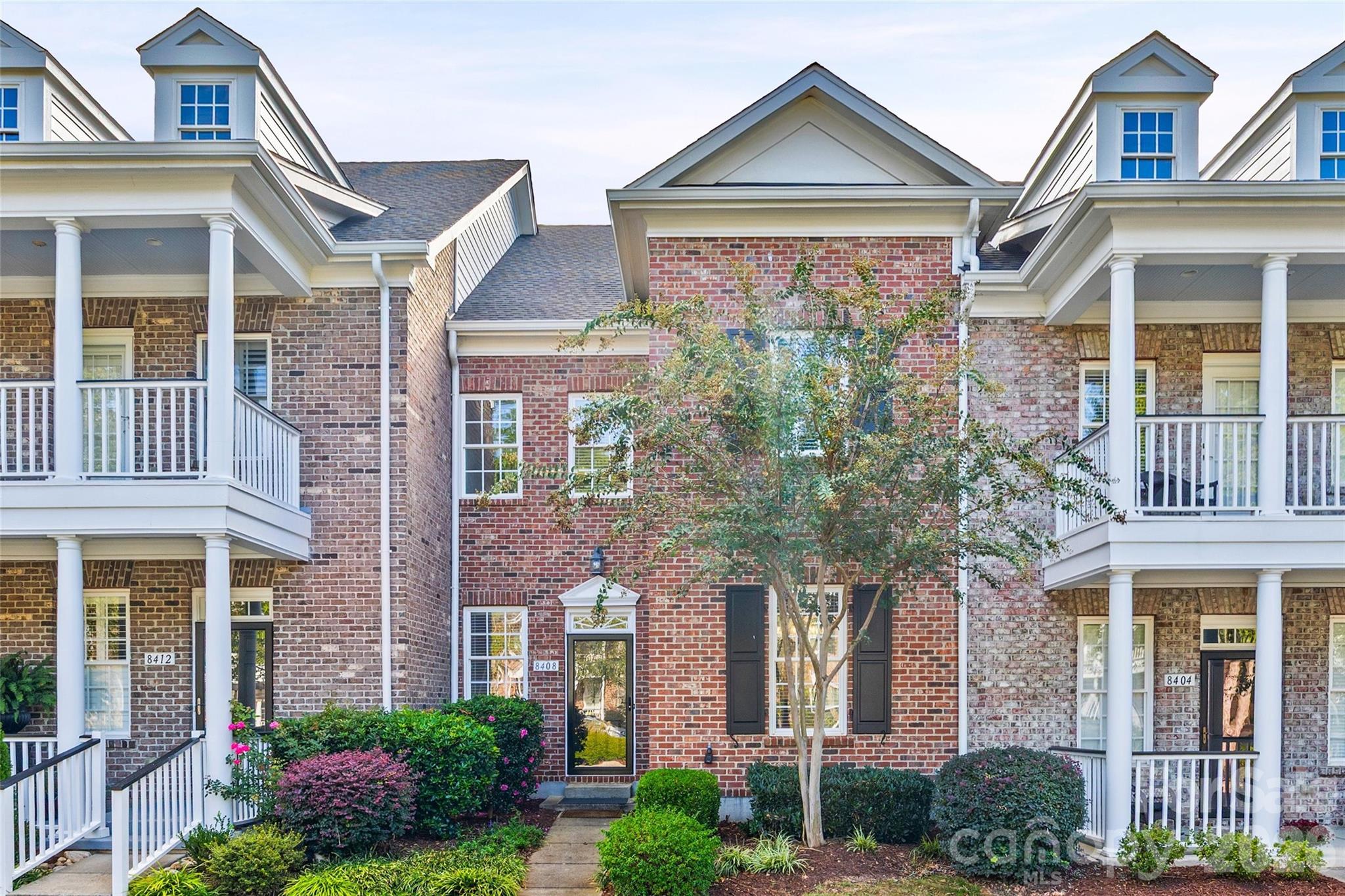 Welcome home to this 2-story, full-brick townhome with granite countertops, stainless steel appliances, crown molding, hardwood floors throughout downstairs, and a private, fenced garden space. All BR upstairs, Master ensuite has 2 large walk-in closets, garden tub, spacious stall shower, dual vanities. Laundry room upstairs has utility tub, washer & dryer. 2-car detached garage. HOA fee includes water and trash. Across from movies, dining, and shopping!

PRICE REPOSITIONED AND SELLER OFFERING $10,000 FOR BUYER TO USE AS THEY PLEASE.