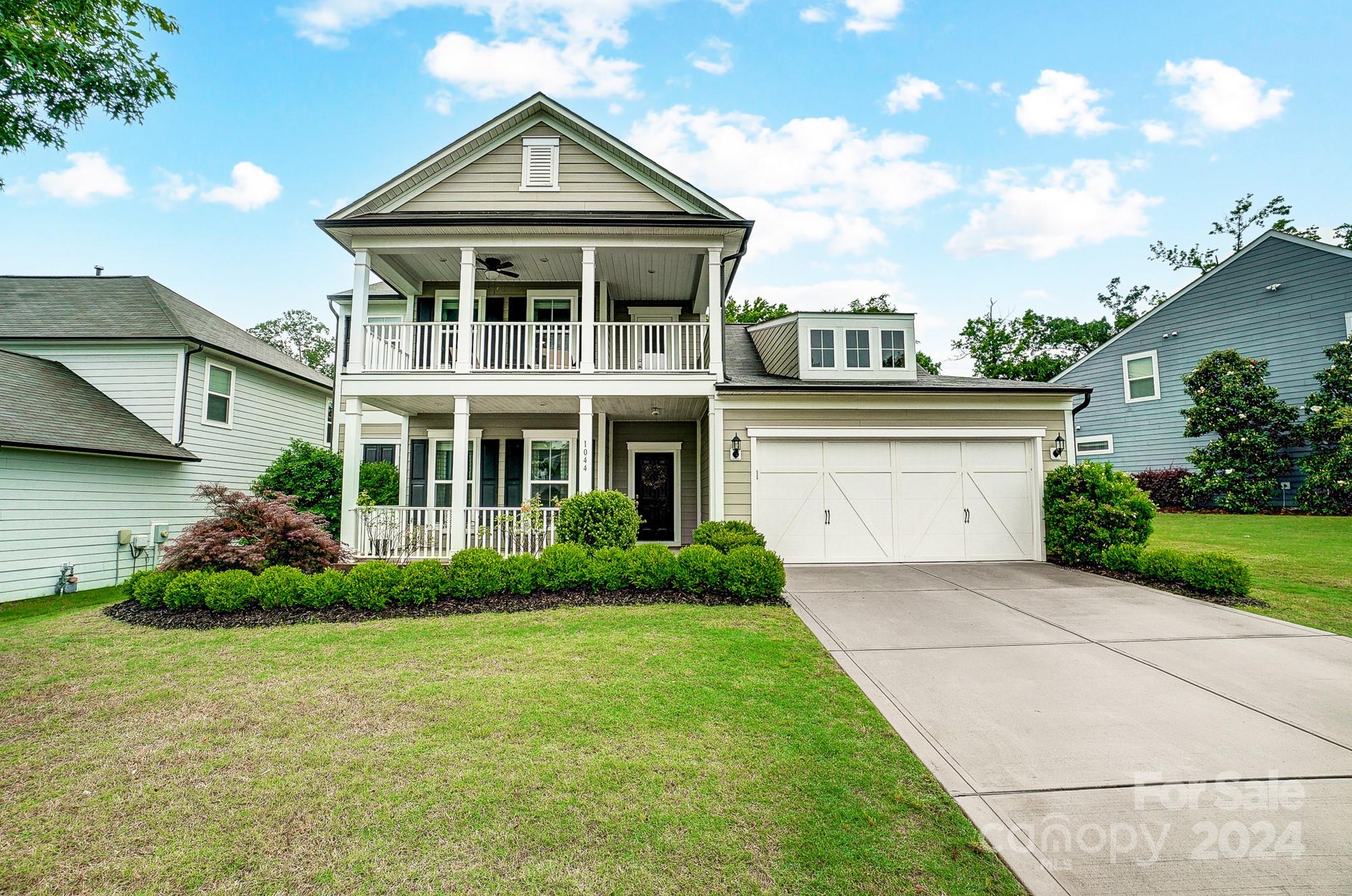 Beautiful home in the sought-after community of Springview Meadows, boasting top-rated public schools. This home offers double front Charleston style porches, an open floor plan that is perfect for entertaining, walls of windows, and plenty of closets for storage. The gourmet kitchen is a chef's dream, featuring abundant cabinets, a large island, granite countertops, and exquisite tile backsplash. Equipped with a gas cooktop, wall ovens, and a sleek exhaust hood, this kitchen is as functional as it is beautiful. A mudroom offers a built-in drop zone area and flex space with a desk. The main floor boasts a spacious primary suite with a large walk-in closet. Three additional bedrooms upstairs, one of which includes a private bath, have large closets. The bright and airy loft offers direct access to the upper balcony. The backyard is bordered by mature trees, providing privacy and has a firepit. 
Conveniently located near shopping, dining, and major highways. Washer/Dryer/Drapes convey