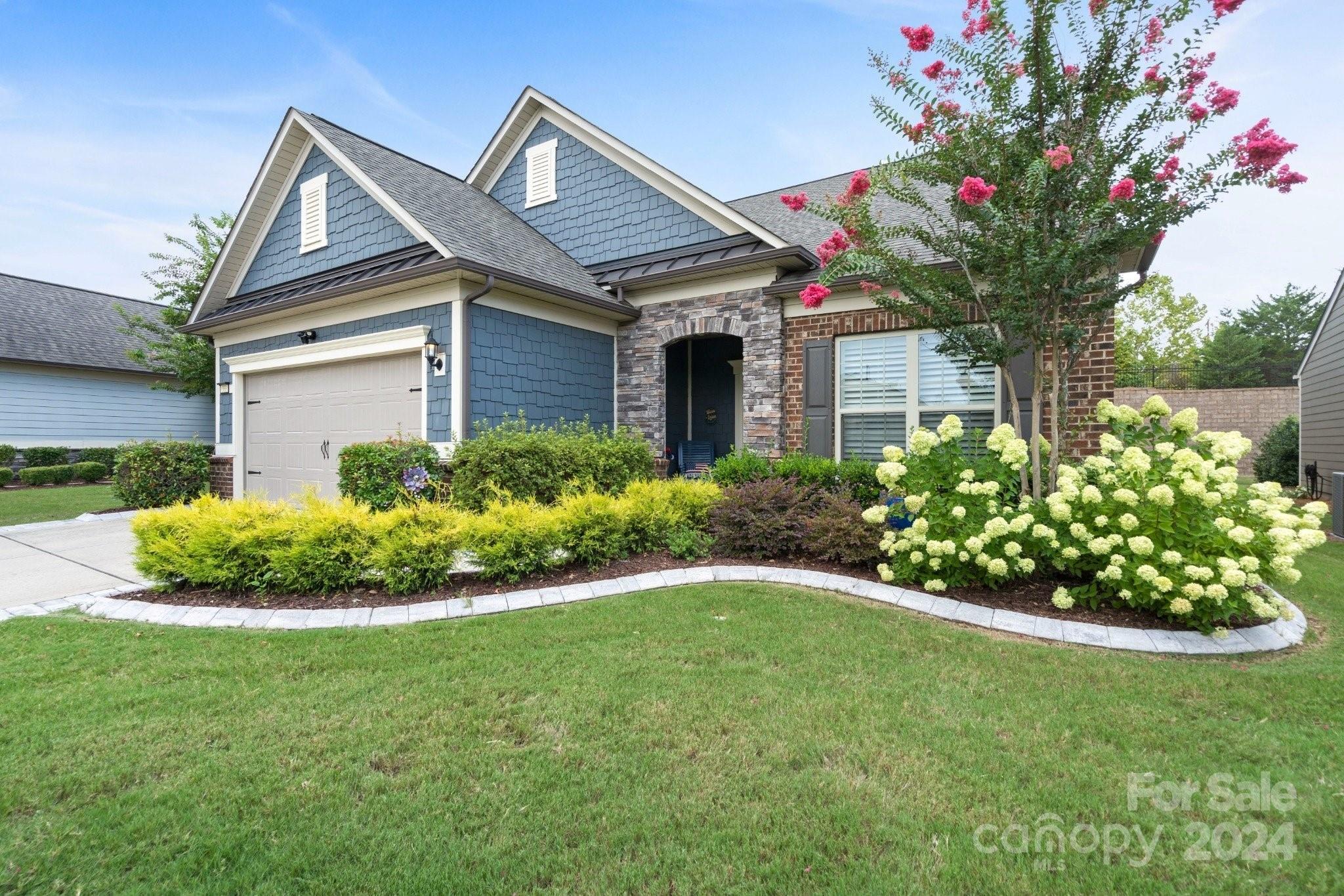 Welcome home . . . 3 BR 3 Bath Martin Ray model is the favorite of the Expedition Series. This pristine 2 level home offers numerous upgrades. Vinyl plank & tile flooring on the 1st floor - no carpet. Open concept living, great for indoor/outdoor entertaining. Upgraded Kitchen, KitchinAid ss appliances, gas cooktop, large island w/seating, pendant lights. Upgraded light fixtures. Sunroom leads to 3 season rm leading to patio & back yard. Primary BR w/tray ceiling & fan. Primary bath w/zero entry spa like shower, custom walk-in closet. 2nd level w/solid stair treads, chair lift, carpet in loft & 3rd BR, 3rd full bath, walk-in attic storage. Drop Zone leading to 2 car + tandem, Garage, irrigation. Lawn maintenance included. Tons of amenities--indoor/outdoor pools & hot tubs, 8 lit pickleball cts, 4 lit tennis cts, 2 bocce cts, dog park, playground, fitness center, full time activities director. Come join us in the Orchards. It' a great place to call home.
