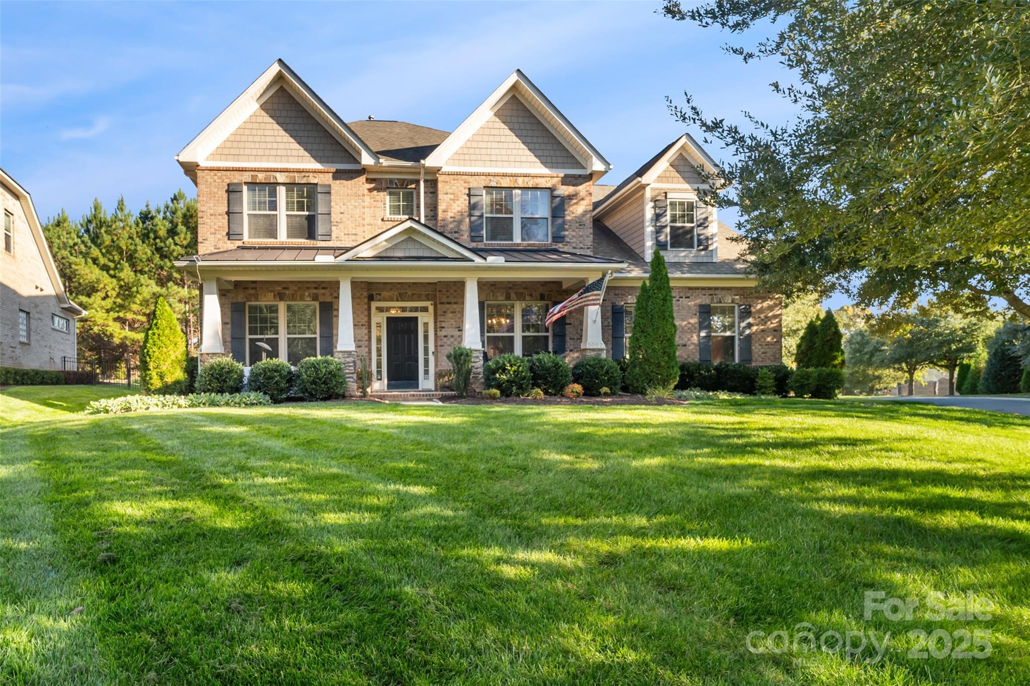 Gorgeous home in the highly sought-after Barber Rock community! A large covered front porch welcomes you into a foyer with wainscoting. The spacious living room features coffered ceilings, a beautiful stacked stone fireplace, and abundant natural light. The gourmet kitchen offers an oversized island, recessed lighting, pantry, and coffee station area—perfect for entertaining. A dedicated office provides flexible space for work or study. Upstairs includes four bedrooms, three full baths, and a generous bonus room with a walk-in closet, accessible by a rear staircase. Outdoor living impresses with a built-in kitchen, stone firepit, covered seating, and extended patio. If a pool is on your wish list, the backyard provides more than enough room to bring your dream to life. A three-car side-load garage completes this exceptional home. Conveniently located near top-rated schools and minutes from Indian Land, Fort Mill, and Ballantyne, with easy access to shopping, dining, and neighborhood amenities. This one truly has it all! Schedule a private tour today.