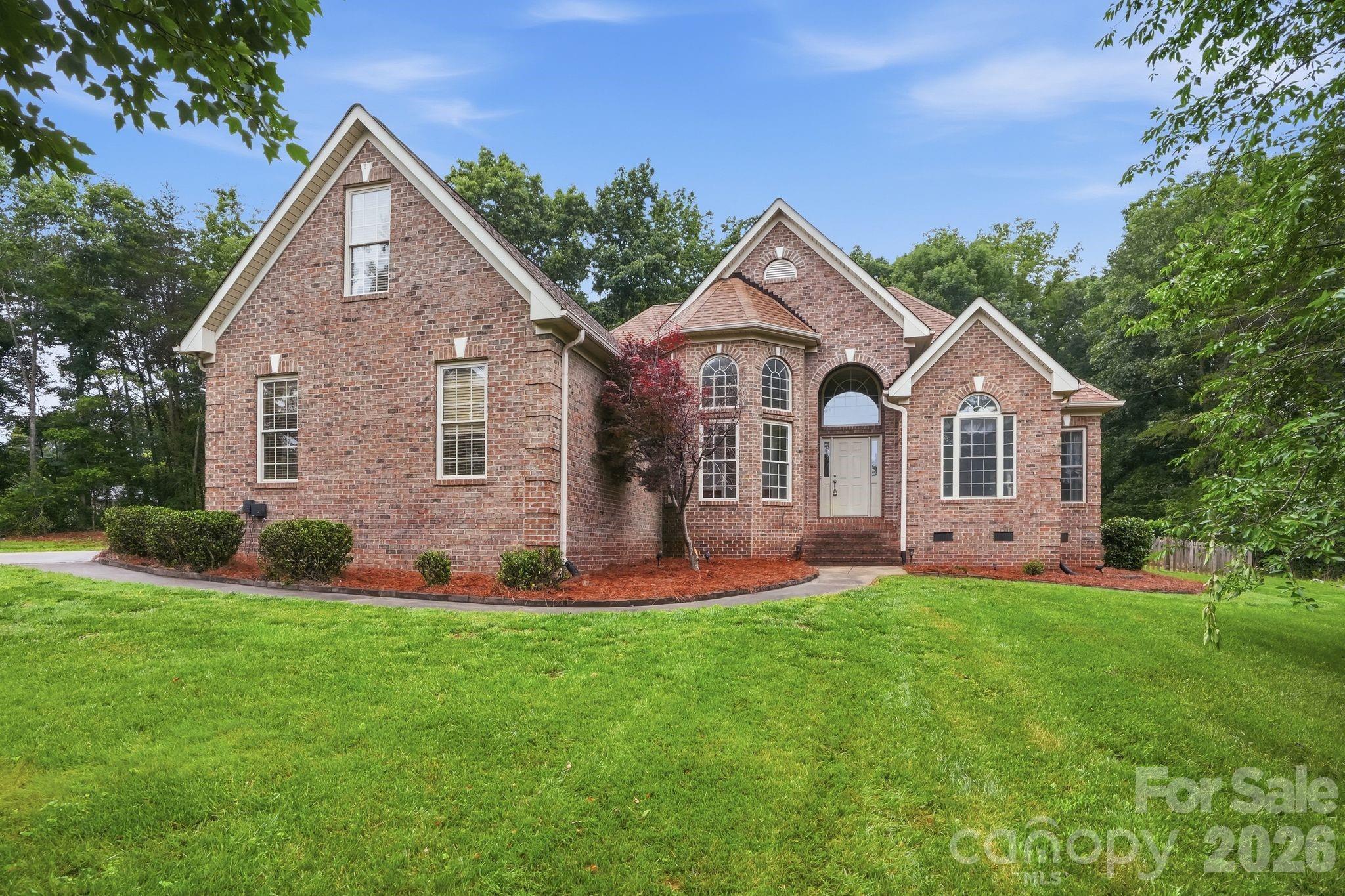 Welcome home to your own private retreat in the highly desirable North Lincoln School District! Situated on over 2 acres, this full-brick home offers 3 bedrooms, 2 full bathrooms and more than 2,100 +/- sq ft of comfortable living space.

Inside, you’ll find spacious living areas with vaulted ceilings that create an open and airy feel throughout the home. The finished room over the garage provides flexible space that can be used as a bonus room, home office, playroom, media room or guest area to fit your needs.

Step outside and enjoy the ultimate backyard oasis featuring a heated saltwater inground pool, perfect for relaxing or entertaining year-round. The expansive property offers plenty of room to spread out and enjoy the privacy of country living while still being conveniently located near everyday amenities.

Additional features include a two-car attached garage and an outbuilding for extra storage, hobbies, or workspace needs. Enjoy the peaceful setting while being less than 10 minutes from downtown Lincolnton, Highway 321, Highway 150, Highway 73, making commuting and daily errands a breeze.

If you’ve been searching for space, privacy, and convenience all in one property, this is one you don’t want to miss!
