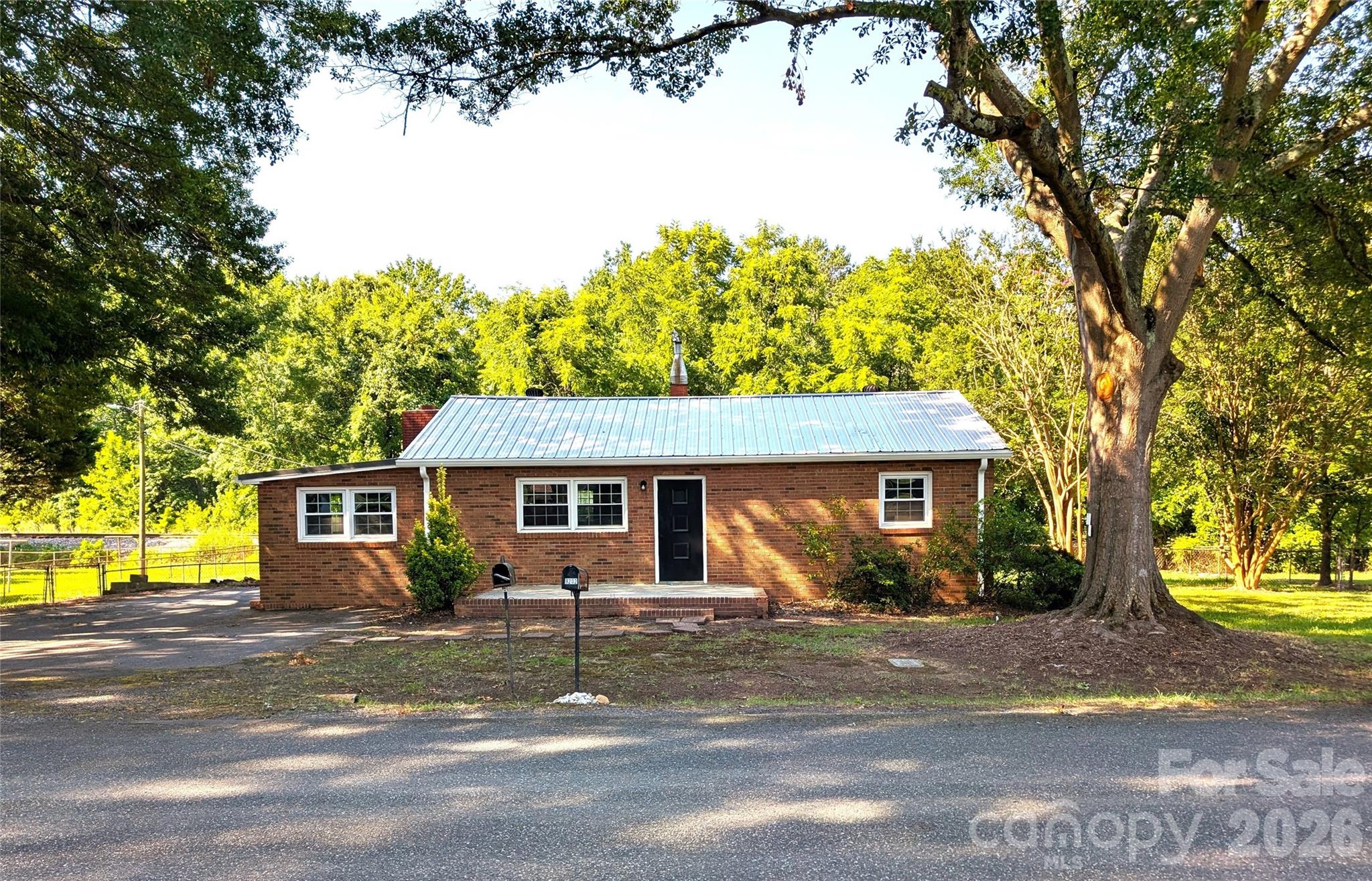 Large Lot with Endless Opportunity!  EASY Access I-485!
This 3 Bedroom 1 Full Bathroom has been remodeled with LVT Flooring throughout, Recessed Lighting, Blinds, Fixtures, and Fresh Paint! Kitchen comes with Marble Countertops, Stainless Steel Appliances, and NEW Cabinets.  Separate Laundry Room located off Kitchen equipped with Washer/Dryer Hookups.
Full bathroom has been updated with a New Vanity, and Refinished Bathtub.  3 spacious bedrooms, all with ample Closet space.  Fenced-in, Wooded, Fully Fenced Backyard provides an atmosphere ideal for any occasion, and is a great space for Pets!  Enlarged Driveway allows for Extra Parking Space.
Conveniently located to I-485, I-85, Airport, White Water Center, Shopping, Entertainment, Restaurants, Belmont, Huntersville, Mount Holly, and Uptown Charlotte!