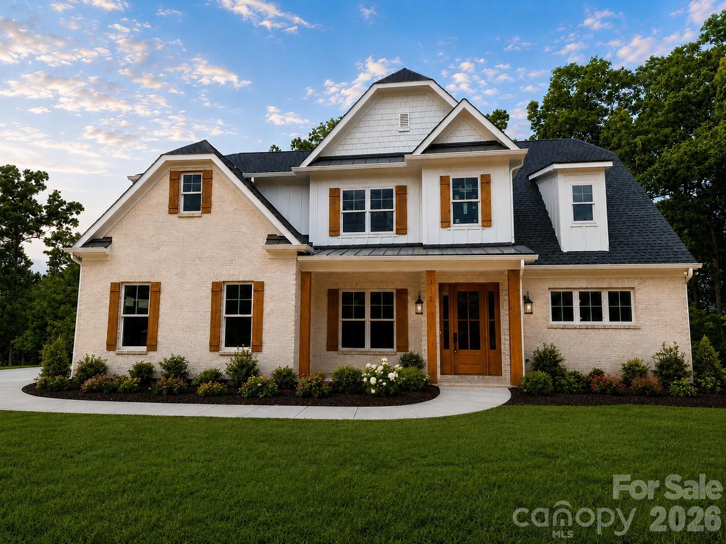 STUNNING NEW CUSTOM-BUILT ESTATE ON 2.14 ACRES IN PRIME INDIAN LAND LOCATION! Welcome to this masterfully crafted, new construction custom home where no detail has been overlooked and top-end finishes shine throughout. Situated on a private 2.14-acre lot, this property perfectly blends the peace of acreage living with unparalleled suburban convenience. GRAND ARCHITECTURAL ENTRYWAY & ELEVATED DESIGN: From the moment you arrive, the exceptional curb appeal and welcoming rocking-chair front porch set a luxurious tone. Step through the front door into a spectacular, grand two-story foyer. This dramatic entrance is completely dressed in extensive custom molding and anchored by a magnificent statement light fixture. Soaring 8-foot doors throughout the main level instantly amplify the home's grand scale and custom craftsmanship. ELEGANT MAIN LEVEL LIVING & ENTERTAINING: Just off the foyer, the formal dining room serves as a perfect backdrop for gatherings, highlighted by an elegant coffered ceiling. The heart of the home is the expansive great room, which features its own stunning coffered ceiling. Designed for modern living, this space flows effortlessly into the dining area and a true chef’s dream kitchen. GOURMET CHEF'S KITCHEN WITH PREMIUM UPGRADES: The gourmet kitchen is loaded with high-end, designer-grade finishes, including: A massive center island featuring a striking quartz waterfall edge and bar seaing. Premium ZLINE appliances, anchored by a professional-grade 48-inch gas dual oven range. Striking quartz countertops seamlessly paired with a matching full-height quartz backsplash, Pristine white cabinetry featuring custom glass accent doors and soft-close hardware. Sophisticated under-cabinet lighting that beautifully illuminates the workspaces, A deep walk-in pantry offering incredible storage space. MAIN-LEVEL PRIMARY RETREAT: Tucked away for ultimate privacy on the main floor, the primary suite is a true sanctuary. It features an elegant tray ceiling and a spa-inspired primary bathroom. This luxurious bath boasts dual vanity sinks, a dedicated linen closet, and a jaw-dropping floor-to-ceiling tile shower. Just off the bathroom, the massive walk-in closet comes fully equipped with a custom-built closet system to maximize organization. UPSTAIRS ENTERTAINMENT & BEDROOMS: The second floor features an incredibly versatile layout designed for family and guests alike. Generously sized secondary bedrooms, each equipped with large closets, and bathroom access. A massive recreation room, perfect for a pool table, media lounge, or home theater. A separate, large bonus room offering endless possibilities as a home gym or quiet office. FUNCTIONAL LUXURY & BACKYARD OASIS: Every inch of this custom floor plan was engineered for luxury and functionality, including a spacious drop-zone mudroom directly off the garage, a large dedicated laundry room, and a massive 3-car garage. Upgraded luxury vinyl plank (LVP) flooring spans the entire home for a seamless finish, paired with beautifully tiled bathroom floors. Step out back onto the oversized rear patio, perfect for weekend entertaining. The patio overlooks your vast, ultra-private 2.14-acre backyard, offering plenty of room for a future custom pool or private garden. UNMATCHED INDIAN LAND LOCATION: While you will feel a world away on your private acreage, this home boasts an unbeatable Indian Land location. Enjoy unparalleled proximity to modern conveniences—you are just moments away from the brand-new Costco, Target, premier shopping districts, local dining hubs, and the medical center. Commuting is a breeze with easy access to Ballantyne and major interstates, all while being zoned for highly sought-after Indian Land schools. Do not miss this rare opportunity to own a brand-new, acreage-lot custom build in one of the region's most booming locations. Home will be ready for its new owners August 7, 2026. Professional photos coming soon.