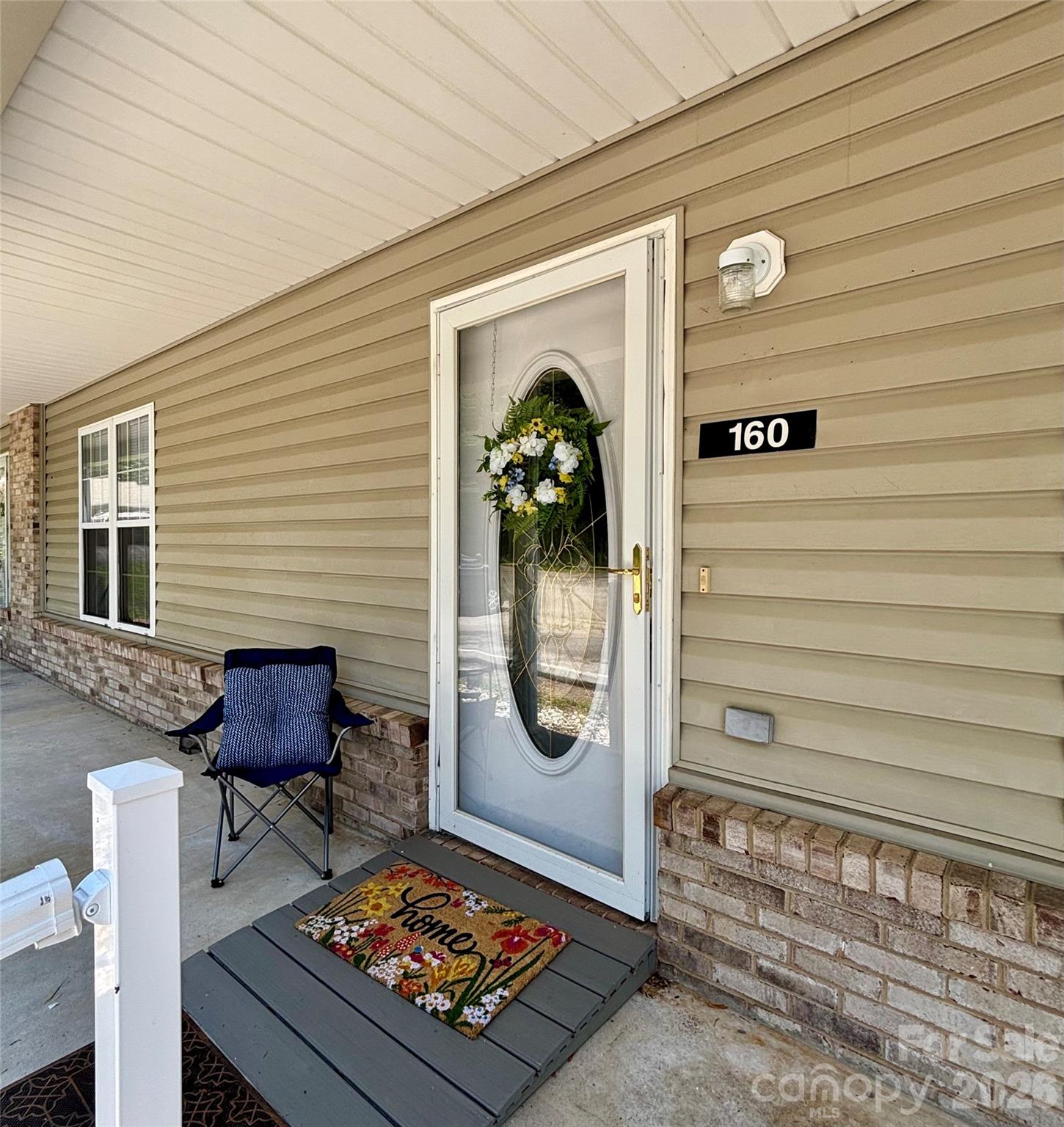 Discover the perfect blend of comfort and convenience in this charming 2 bedroom, 2 bathroom townhouse. Situated on a .08 acre lot this home offers the ease of single floor living with no stairs required inside. The interior features durable vinyl plank flooring throughout, creating a seamless and modern look that is both stylish and easy to maintain. Enjoy your morning coffee or evening relaxation on the back deck, perfectly positioned to overlook a serene wooded backdrop- offering a connection to nature in your own back yard. Ample storage potential in the basement area which is accessed from an exterior door. This location is stellar! Minutes from the hospital, YMCA, stores of all kinds, restaurants and Interstate 40! Low maintenance living in a location that puts everything in reach. Simplify your life without sacrificing comfort. This home is ready for you!