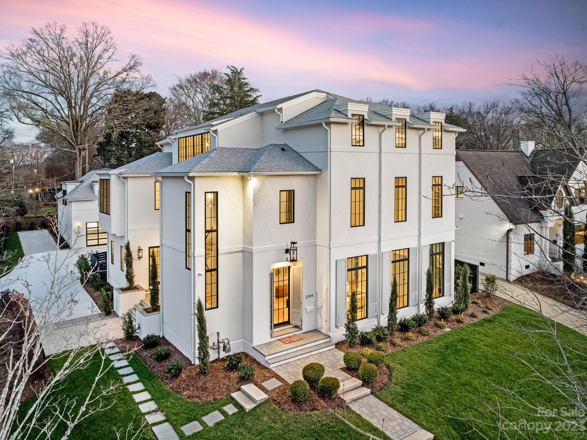 Great opportunity for custom new construction by DuBose Custom Homes in the heart of Myers Park. Quality of construction & attention to architectural detail is evident throughout. Designer selections combined w/ a thoughtful floor plan & high-end materials make this a truly unique property. Home features spacious gourmet kitchen w/ marble countertops, dual islands, Wolf/Sub-Zero appliances, wet bar & separate scullery. Open floor plan ideal for entertaining w/ floor to ceiling windows. Wide white oak floors, over 11 ft ceilings, fireplaces in great room & living room. Stunning grand circular staircase w/ forged iron handrail leads to 2nd floor featuring Primary suite w/ balcony & spa like bath featuring large shower, heated towel bars, soaking tub & huge custom closet. 3rd floor offers lounge & wet bar, 2 additional bedrooms/ensuite baths! Future elevator option. Private outdoor oasis includes heated saltwater pool & spa, bluestone patio & outdoor fireplace ideal for entertaining.