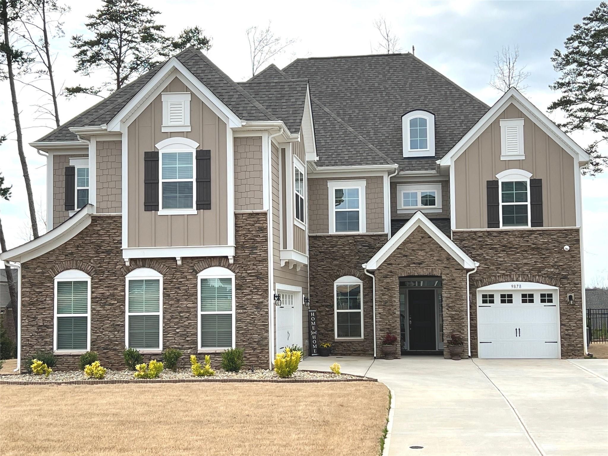 2021 built, stunning 5 BR/4 Bath home in the Gated community Bretagne. Beautiful landscaping & stone accents create inviting curb appeal for this luxury home offering open concept living & spacious oversized rooms! The truly gourmet Kitchen, will amaze w/an abundance of white cabinetry & counter space. The ceiling speakers T/O much of the home for soft back ground music. Other features inc hwd floors, crown molding, iron balusters, 3 car garage & Cul-de-sac lot. A stone fireplace & hearth fits in perfectly w/the large family room as a cozy place to gather. Main floor bedroom & full bath make a comfortable area for your guests. The 2nd floor Primary Suite offers a tray ceiling & beautiful bath oasis w/an oversized walk-in shower, soaking tub &. large closet. 3 addt'l bedrooms & two addt'l full baths, large BONUS room & LOFT offer enough space for everyone. Like being outside? Enjoy a relaxing evening when you step out to the covered patio which overlooks the wonderful, fenced-in yard.