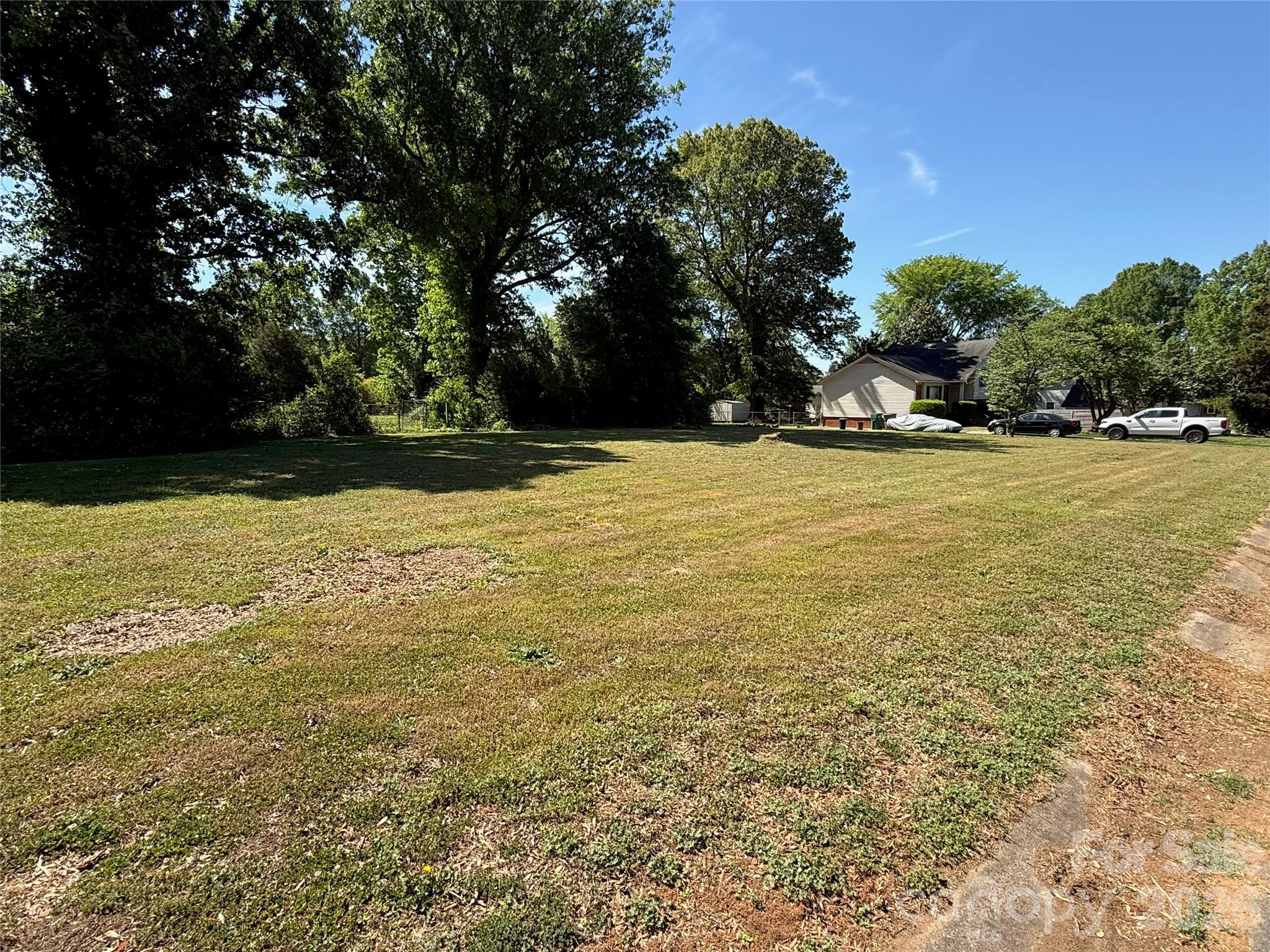 Prime real estate ready for a new owner! Flat cleared lot for sale being sold with the adjoining lot facing The Plaza. Acreage totals approximately 1.318 acres according to tax records. Currently zoned N1-B. Refer to the City of Charlotte UDO to determine if this prime piece of real estate could be right for you! Parcel is being sold with parcel #09705302 and will not be sold separately. Sale is subject to a 10 day upset bid period. Contact your agent for more information about the sale.