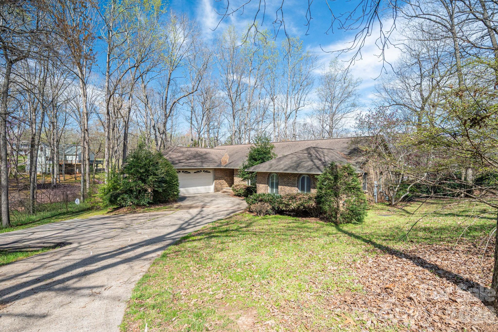 Wonderful investment opportunity on Moss Lake. This estate home is a full brick basement residence situated on a quiet, dead-end lot of nearly one acre.

The home features an open floor plan with vaulted ceilings, a beautiful kitchen, and a great room with a fireplace. The main level includes a split-bedroom layout for added privacy. Outside, you can enjoy lake living at its best from the screened porch or the large walk-out patio.

Additional features include: central vacuum system, basement with a separate heating unit, unfinished basement space ready for your personal touch, beautiful lake views

The property is being sold "AS-IS", and the seller will not perform any repairs.
