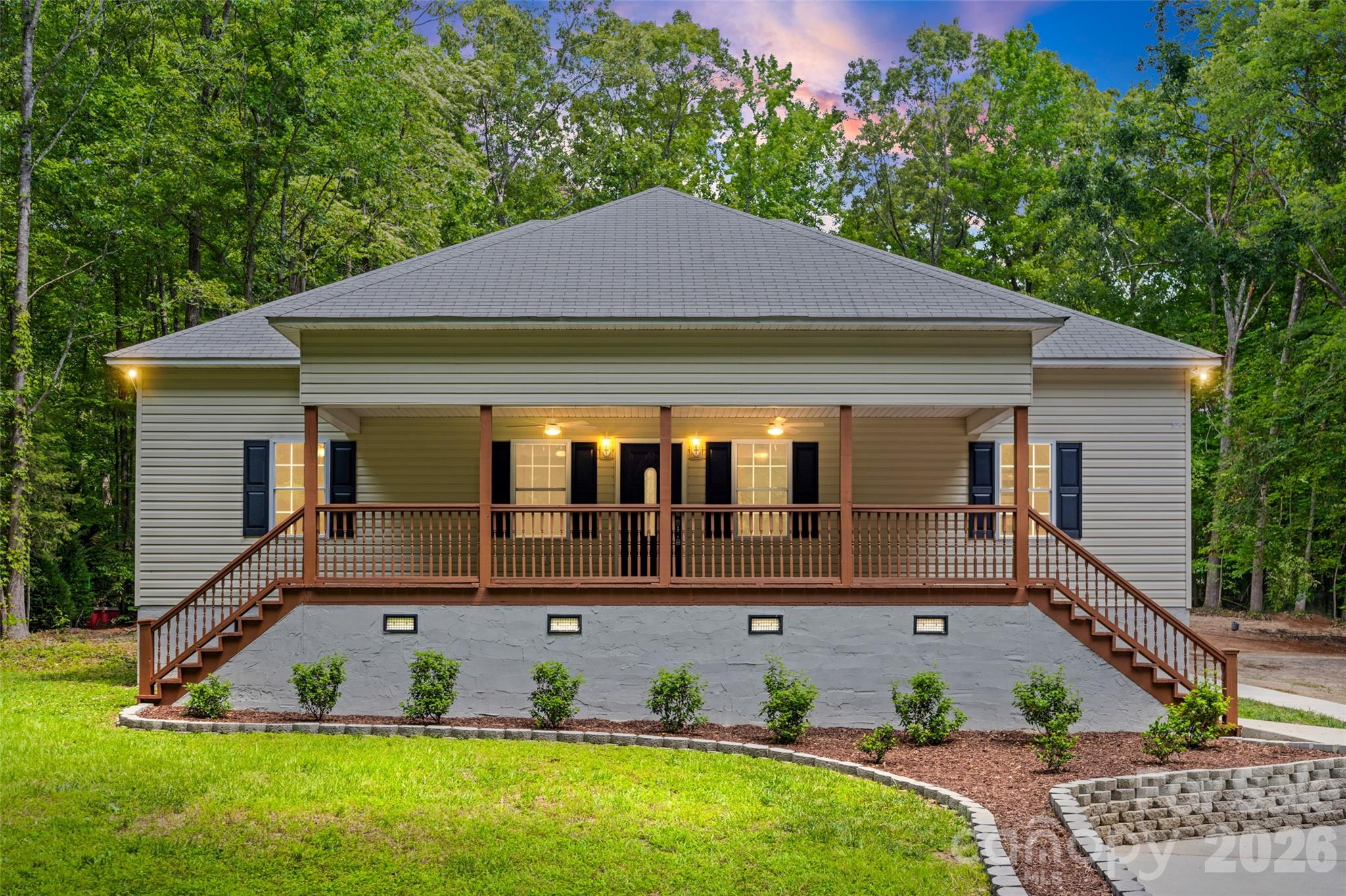 Welcome to your new home! This property is truly a gem. Tranquility of the country, conveniences of modern luxury. This beautiful 4 bed 3 bath 2500 sqft property is on a spacious 2.5 acres and is located in the coveted and award winning Clover school district. As you approach the property on it's long driveway, you will notice the tall thick trees that shield the property from the road, providing extra privacy. Get productive in the huge 900 sqft 3 car garage that's wired with it's own electric panel that can support a heavy duty workload, or simple relax and enjoy the property on the large raised front porch, or the vast open backyard. As you move into the interior, you will find a move-in ready house that has been freshly updated with NEW HVAC units (one for each floor- two total! Each with it's own thermostat), NEW Quartz countertops, NEW kitchen appliances, NEW carpet, NEW water proof vinyl plank floors, NEW paint, NEW vanities, NEW sinks, NEW faucets, NEW toilets, and more!  (Unattached furniture e.g. couches, beds, etc. were added via virtual staging to help buyer visualize space. New sod grass was laid in backyard, and some photos were edited to include extra grass around the sod, to help buyer visualize yard after grass seed is added and germinates) Come see this beautiful home yourself and move in today! (Property was appraised at $580,000!).