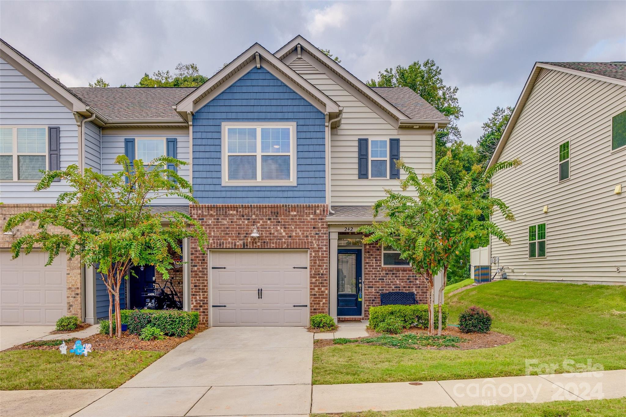 Seller offering up to 5k buyer concessions with acceptable offer.  Welcome to 242 Ascot Run Way in beautiful Fort Mill, SC! This charming end unit townhome features 3spacious bedrooms and 2.5 baths, perfect for comfortable living. Step inside to discover an inviting open floor plan with abundant natural light, accentuated by modern finishes and warm tones. The well-appointed kitchen boasts sleek countertops, ample cabinetry, and a cozy breakfast nook, making it ideal for both cooking and entertaining. The generous living area flows seamlessly to a private outdoor space that backs to a serene wooded area, offering a tranquil retreat right in your backyard. Enjoy morning coffee on the patio or unwind in the evenings surrounded by nature. Upstairs, you’ll find a spacious primary suite with en-suite bath and plenty of closet space, along with 2 additional bedrooms that share a well-designed bathroom. Located in a community with access to local amenities, parks, and top-rated schools.