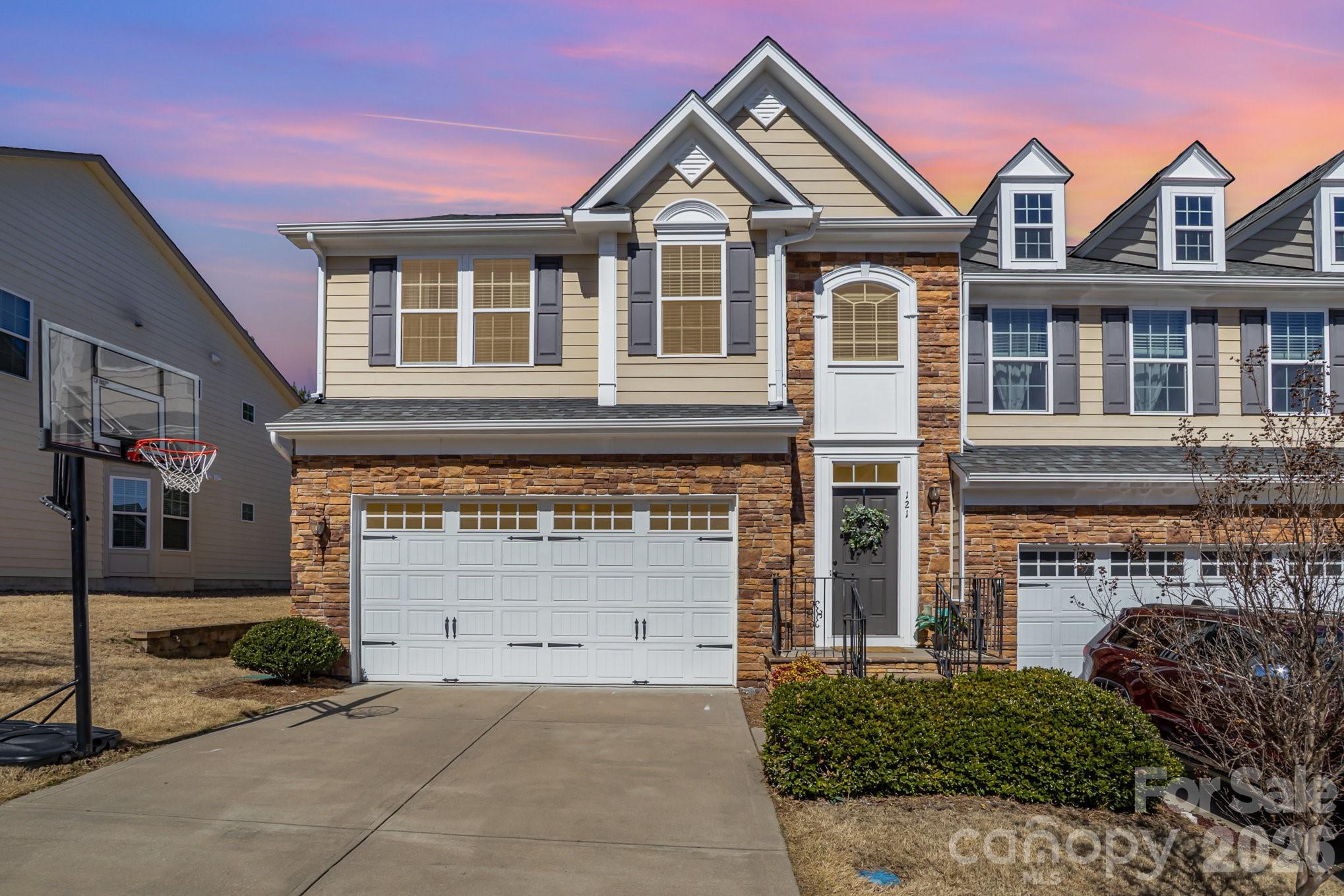 A rare opportunity nestled in the heart of Tega Cay. This exquisite residence offers an unparrallelled townhome living experience. Located just steps away Lake Wylie the this home boasts the "brand new feeling" you are looking for once you step inside. There are only 5 of these floor plans in the community and these units rarely if ever hit the market due to the substantial offerings they provide. Beautiful backyard deck made out of Trex overlooking scenic wooded views. Walk-out basement. Enjoy your own in-home movie theater (with theater seating that conveys) to watch a movie or enjoy the big game. The amenities are endless in Tega Cay including parks, walking trails, Lake Wylie, waterfront parks and more. Easy access to shopping, dining and entertainment as well as home to some of the top-rates schools.