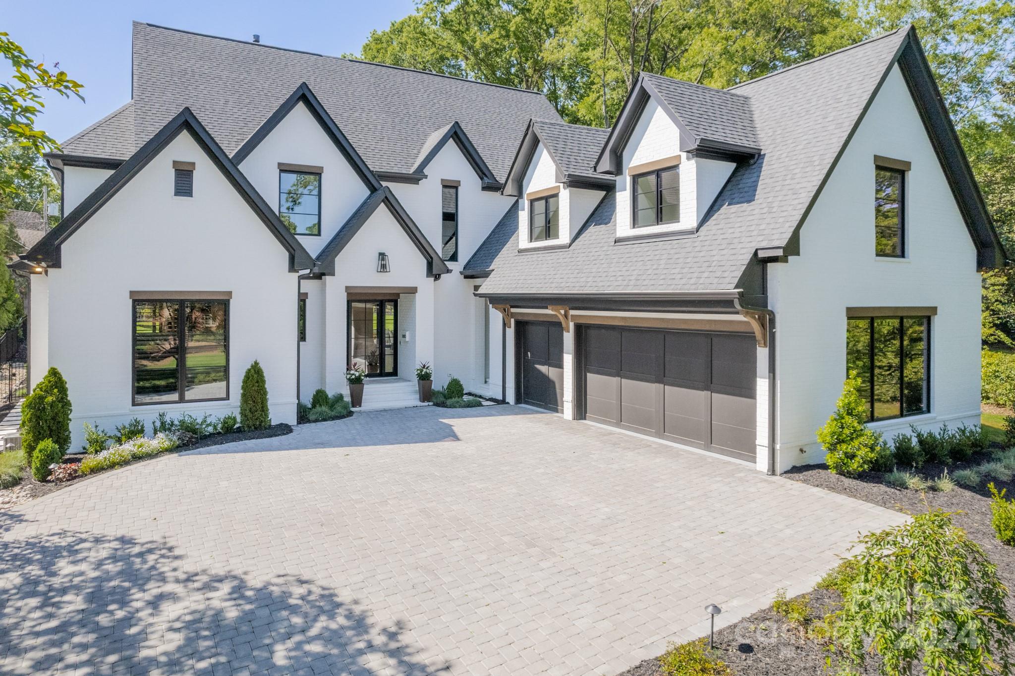 This captivating 5-bedroom home, newly built in 2022 by the talented Hestia Designs, is impressive with Lincoln windows/doors and 10' ceilings on both the 1st and 2nd levels and 9' ceilings on the 3rd. It boasts large rooms with excellent flow for easy entertaining as well as flexible spaces for offices, recreation rooms, and home gyms. A gourmet kitchen with SubZero and Wolf appliances and a large scullery for easy prep and storage is a chef's dream. The home’s open floor plan is complemented by an abundance of natural light streaming through stunning windows, creating a warm, welcoming environment. The view takes you to a PebbleTec pool & hot tub w/marble deck, gas fire pit, and an outdoor kitchen. The 3-car garage is equipped with a storage system, an Autel electric vehicle charger, and has MyQ garage door automation. A whole house Generac generator provides peace of mind. This is not merely a house; it’s a lifestyle, a statement, and a testament to exquisite living!
