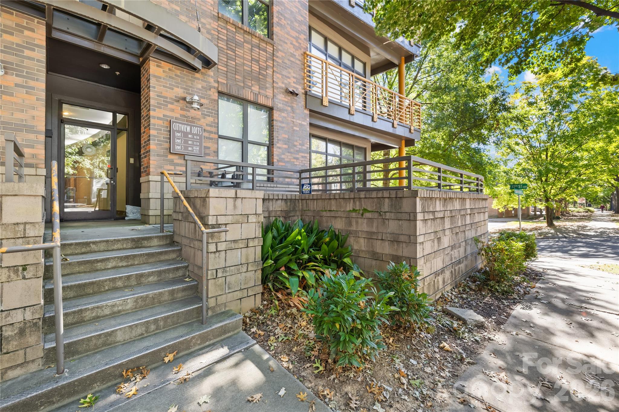 Enjoy Uptown Charlotte living in the heart of First Ward with this stylish End Unit loft-style condo in Cityview Lofts. This 1-bedroom, 1-bath unit offers 659 sq ft of open-concept living space filled with abundant natural light from large windows and featuring prefinished wood floors and an open floor plan. The kitchen includes a granite island, electric cooktop, black ceramic backsplash, and ample cabinetry, while the spacious bedroom offers an expansive walk-in closet and the bath features tile floors and an oversized walk-in shower. Additional highlights include a computer nook, updated lighting, and in-unit washer/dryer. Cityview Lofts offers controlled building access, elevator, and a parking garage with one assigned space. Located steps from restaurants, the Spectrum Center, Light Rail, and Uptown Charlotte, with quick access to I-277 and Charlotte Douglas International Airport, this condo offers both convenience and flexibility, including rental potential