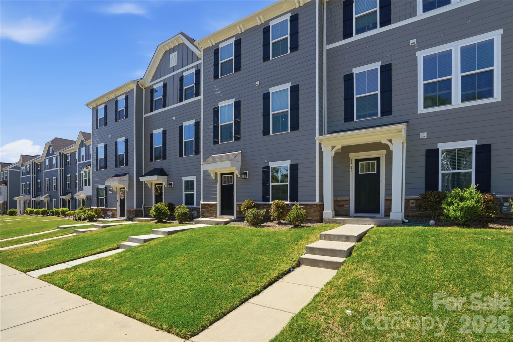 SELLER OFFERING RATE BUYDOWN WITH ACCEPTABLE OFFER! Bright and thoughtfully designed, this North West Charlotte townhome offers flexible living, modern comfort, and everyday convenience in Riverbend Towns near Mountain Island Lake and Riverbend Village.
The entry level features a versatile flex space ideal for office, media, fitness, playroom, or additional living use, along with a rare full driveway + 2-car garage offering parking flexibility not commonly found in similar townhomes. Great storage throughout includes two walk-in closets, coat closet, and spacious linen closet. A 30 AMP outlet in the garage adds additional functionality.
Wide-plank LVP flooring flows throughout the main and upper levels, complemented by natural oak stairs, updated lighting, blinds, and abundant natural light. The open-concept upper level seamlessly connects the kitchen, dining, living area, and deck for comfortable everyday living and entertaining. Kitchen features include frost white quartz countertops, matte black hardware, stainless steel appliances, gas range, and Delta Trinsic faucet. Refrigerator and washer/dryer convey.
Conveniently located near Riverbend Village, Mountain Island Lake, I-485, NC-16, Uptown Charlotte, Charlotte Douglas International Airport, and Huntersville, this move-in ready home offers the perfect balance of flexibility, convenience, and modern living.