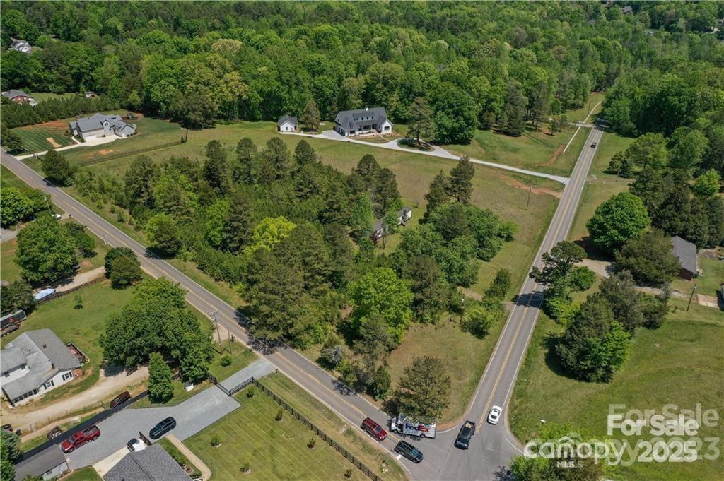 *Prime 3.56 Acres Tract Across from Proposed Summit Farm Development**

This exceptional 3.56-acre tract is perfectly positioned across from the highly anticipated Summit Farm Development, situated within the Neighborhood Edge Planning Area and Neighborhood Services Overlay District. The proposed development includes a diverse blend of commercial, residential, and agricultural elements, envisioned to feature 109 units (including 12 affordable units) alongside various commercial services.

Key Highlights:
- **Mixed-Use Development**: A vibrant community with a mix of building types to cater to different needs.
- **Residential Units**: 109 units, with 12 designated as affordable housing.

Value in land only. Mobile home on property no value.