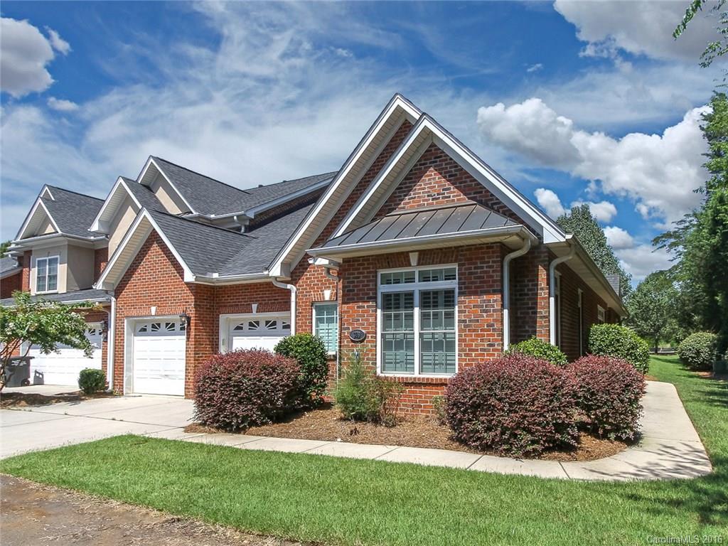 Awesome town home with gorgeous brick exterior and gated community.  Open kitchen, SS appliances, great storage. cute breakfast nook, also has formal dining area. Huge master bedroom with walk in closet.  Master bath has double sink.  Massive great room with beautiful built ins, gas fireplace for those cozy nights.  Whole house is bright and cheery. Back patio perfect for grilling and relaxing! Move in ready! End unit, Come & see this home with great amenities and  low HOA's This won't last long