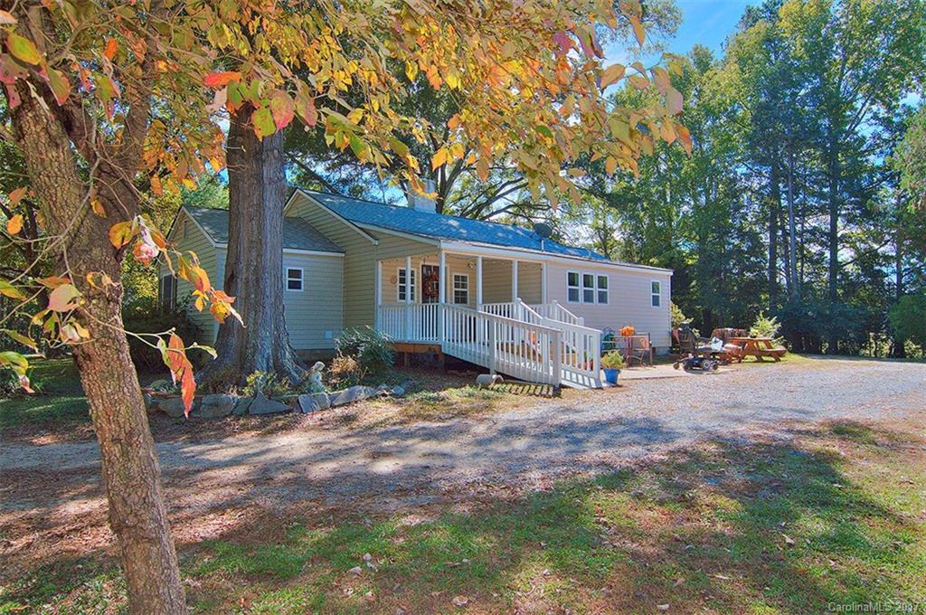 Your dream come true! Amazing ranch home on 1.31 acres just off of Hwy 160 and Hwy 521.  Just far enough for you to feel the privacy of the home but close enough for groceries, dining, and commute to work. This 3 bedroom 2 1/2 bath home has the original 1940's hardwood floors but two year old appliances, kitchen, granite countertops, bathrooms, windows, blinds and much more. Perfect open, split floorplan home with the space to make you think you are in the country. This home is a MUST SEE