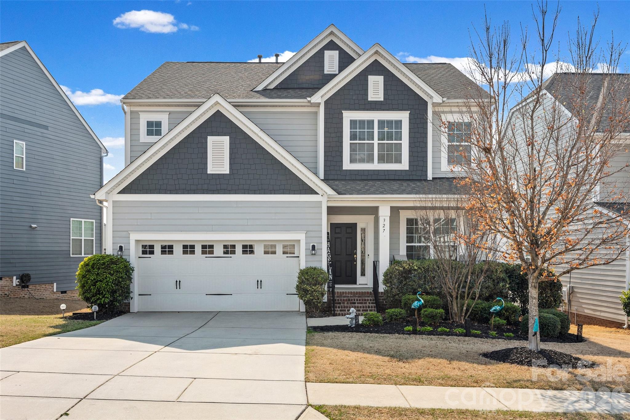 Welcome home to the highly sought after Hawks Creek Subdivision. This move in ready 4 bedrooms, 3 full bathroom home is situated on a lot that opens to green space. The open floor plan features a cozy living room with a gas fireplace that flows seamlessly into the kitchen with granite countertops, stainless-steel appliances, and a large island for entertaining. The dining room is connected to the kitchen with a butler's pantry and a walk in pantry. The main floor includes a guest bedrooms, full bathroom and a drop zone. On the second floor you will find a luxurious primary suite with custom closets, a spa like bath with a walkin tile shower and a soaking tub. Two additional bedrooms, bonus room, full bathroom and a laundry room complete the second floor. The backyard features a stunning 16x22 composite Trek deck overlooking the green space, along with an expansive 12x30 paver patio  complete with matching retaining wall.  The fenced in yard adds privacy and makes the space ideal for pets, play and enjoying peaceful evenings outdoors. This home is part of the award winning Fort Mill School district, conveniently located to I-77 right off Gold Hill Road and only 20 minutes to the Charlotte Douglas Airport.