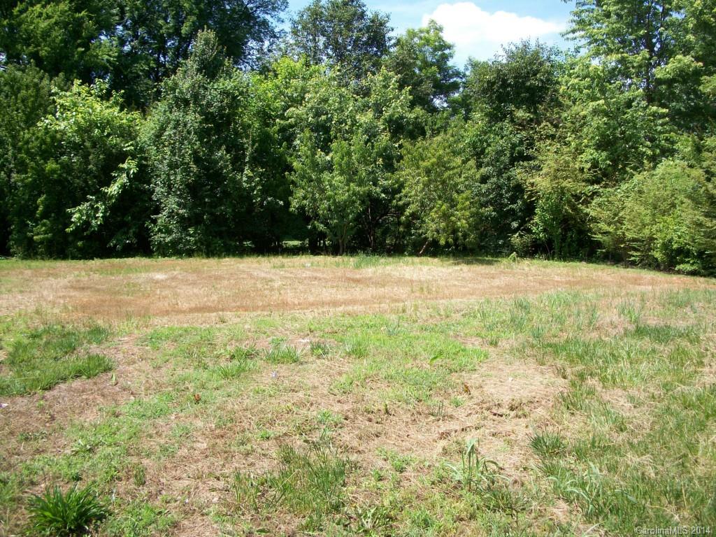 THIS IS A NICE LEVEL LOT. BOUNDED BY BROOKSHIRE FREEWAY TO THE NORTH,  ROZZELLES FERRY RD.
TO THE SOUTH,  WEST TRADE ST. TO THE WEST  AND BEATTIES FORD RD TO THE EAST. 
CLOSE TO UPTOWN.
THE TAX VALUE (FROM TAX RECORDS 7/2013) IS FOR THE LAND ONLY. THE HOUSE WHICH WAS PREVIOUSLY ON THE LOT WAS DESTROYED BY FIRE. AND THE TOTAL PARCEL ASSESSMENT IS 
"UNDER REVAL.  REVIEW".