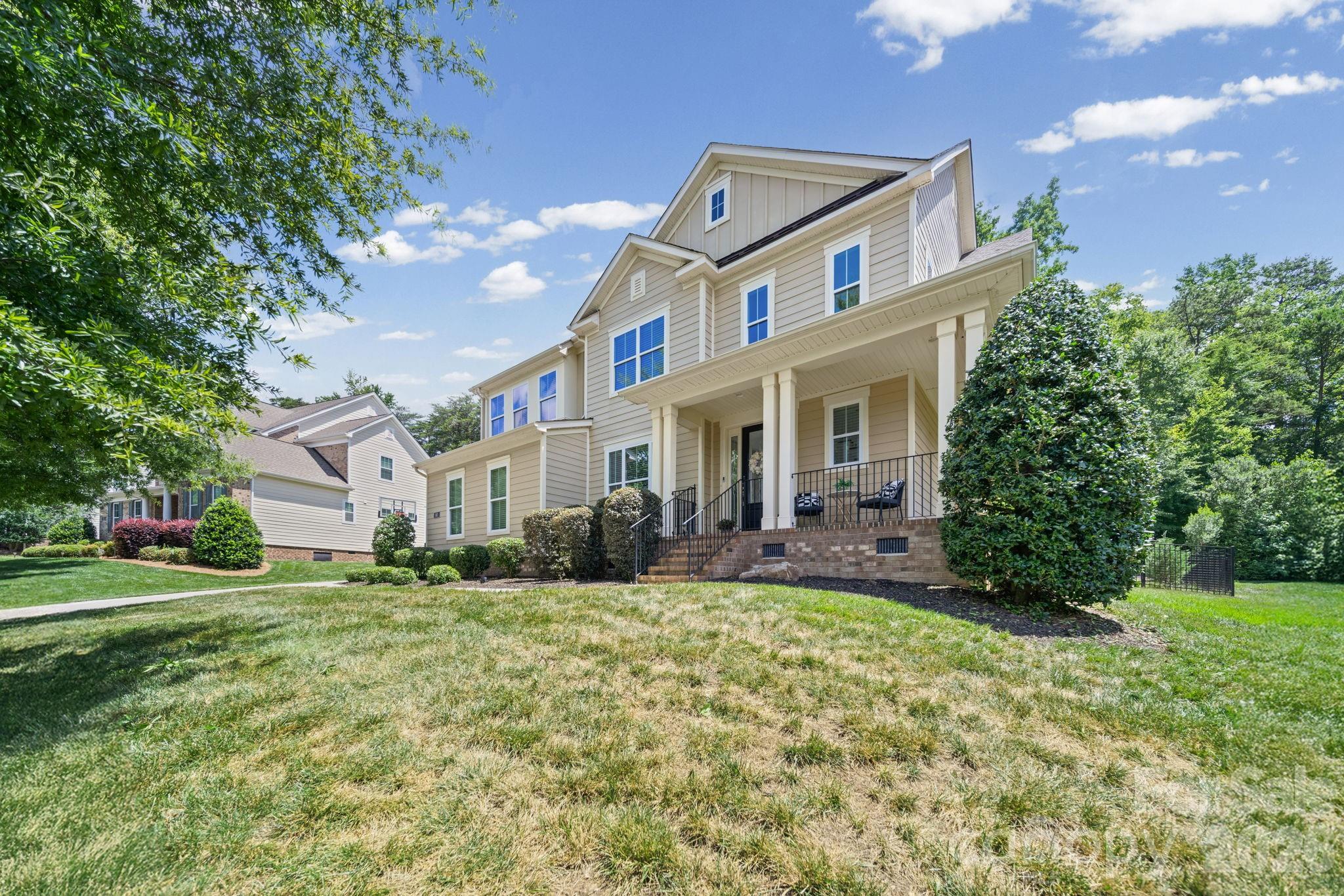 Located on a private half-acre homesite in highly desirable Forest at Fort Mill, this beautifully updated home blends modern comfort with exceptional indoor and outdoor living. Recent improvements—including fresh interior paint, new carpeting, a widened driveway, added walkway, enhanced landscaping, and newly planted privacy trees—complement an inviting, light-filled floor plan designed for today's lifestyle.

The main level features a private guest bedroom with a full bath, a dedicated home office, and a spacious dining area filled with natural light. At the heart of the home is a well-appointed chef's kitchen with a large granite island, abundant cabinetry, gas cooktop, double ovens, and generous workspace that flows seamlessly into the main living area.

Upstairs, the spacious primary suite offers a peaceful retreat with a luxurious en-suite bath and an oversized custom walk-in closet. Two additional bedrooms, a generously sized loft, and a hall bath with dual vanities provide flexible space for family, guests, hobbies, or a second living area.

Step outside to your own backyard oasis. The fully fenced yard showcases a custom heated saltwater pool with an attached spa, expansive paver patio, fire pit, and screened porch—creating the perfect setting for relaxing or entertaining year-round.

The oversized three-car garage offers 2 EV charging stations.  Located in one of Fort Mill's most desirable communities, this home offers the perfect blend of comfort, functionality, and resort-style outdoor living.